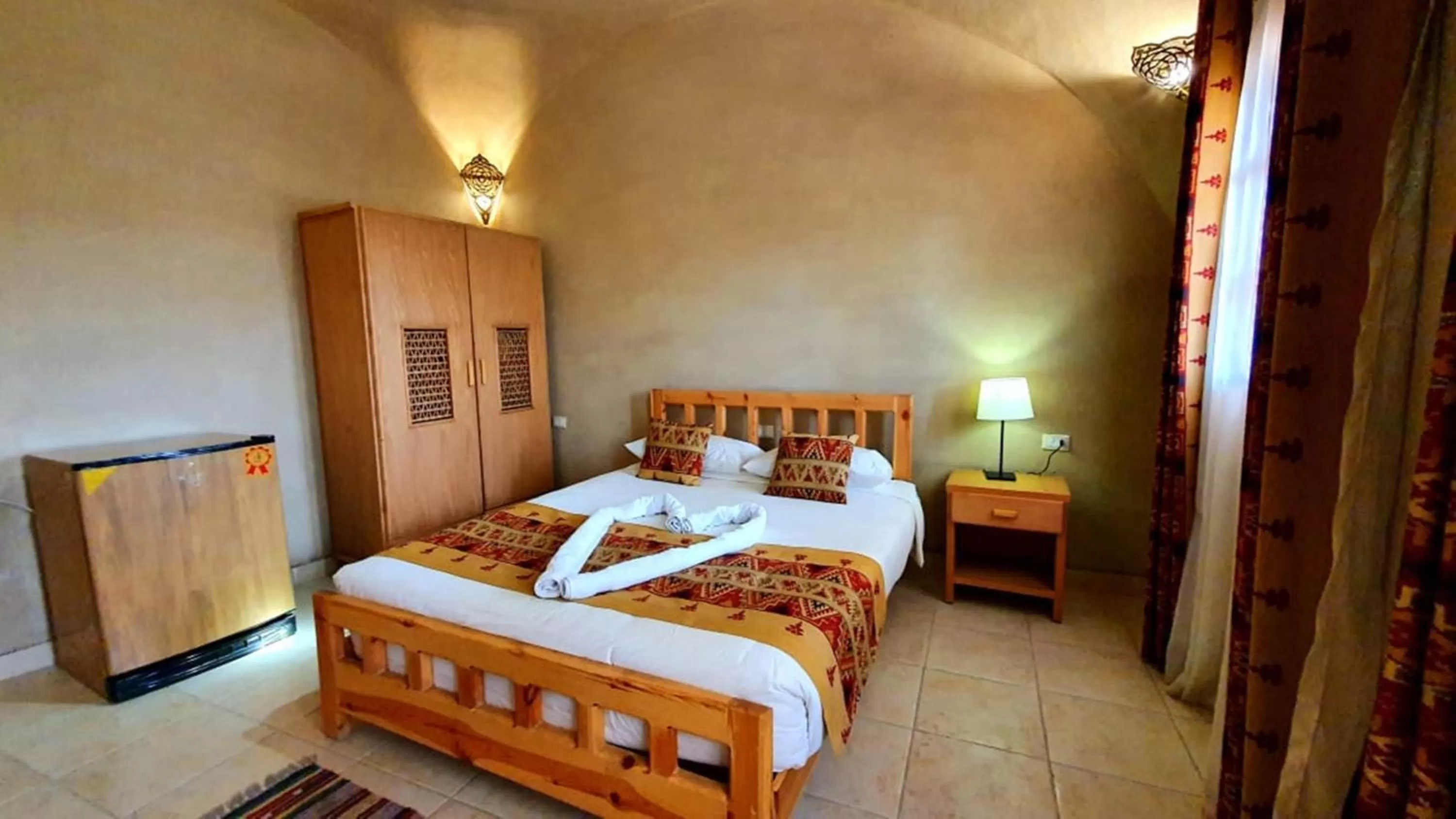 Bed in Embrace Hotel