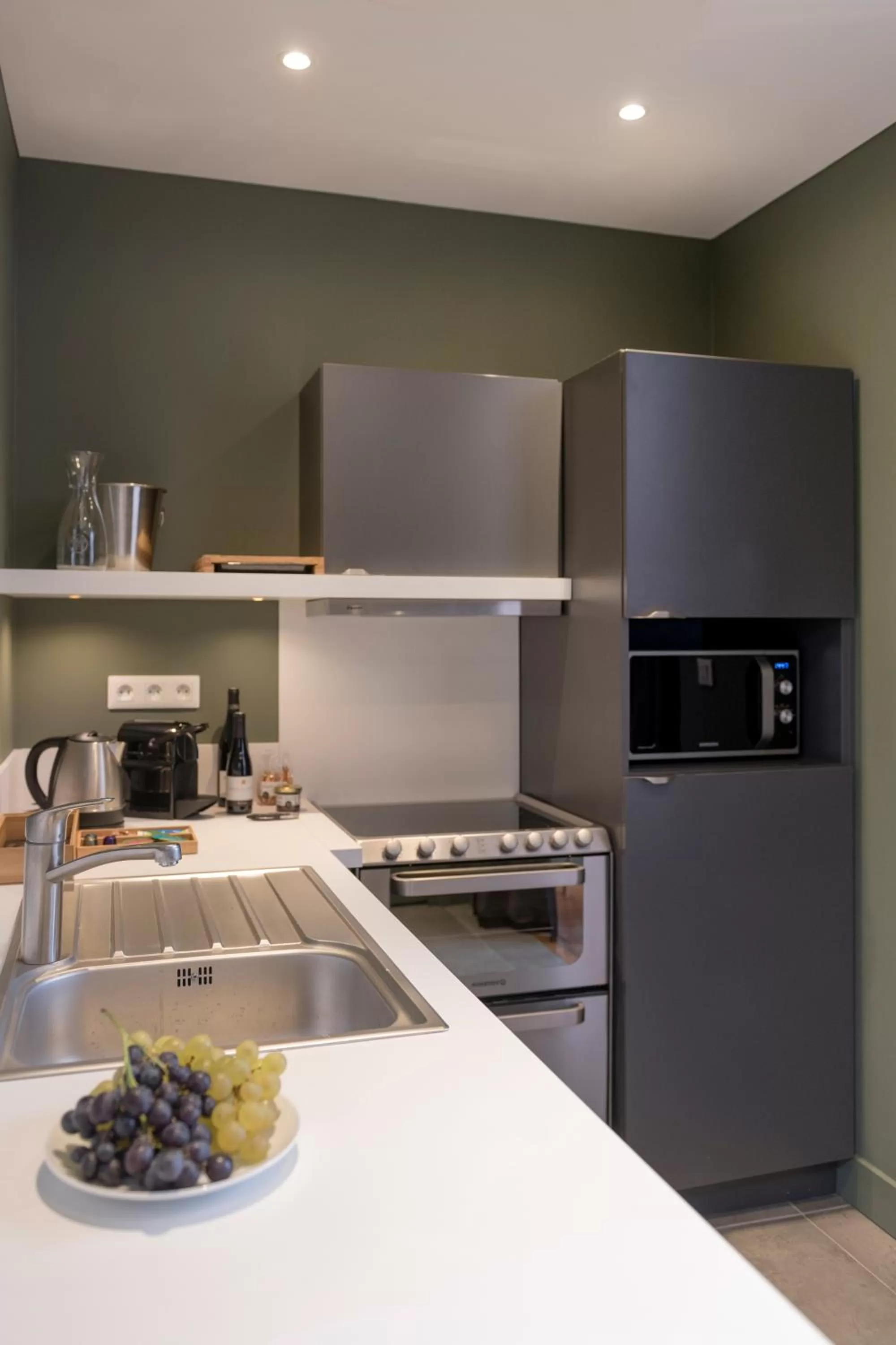 Coffee/tea facilities, Kitchen/Kitchenette in MiHotel Gailleton