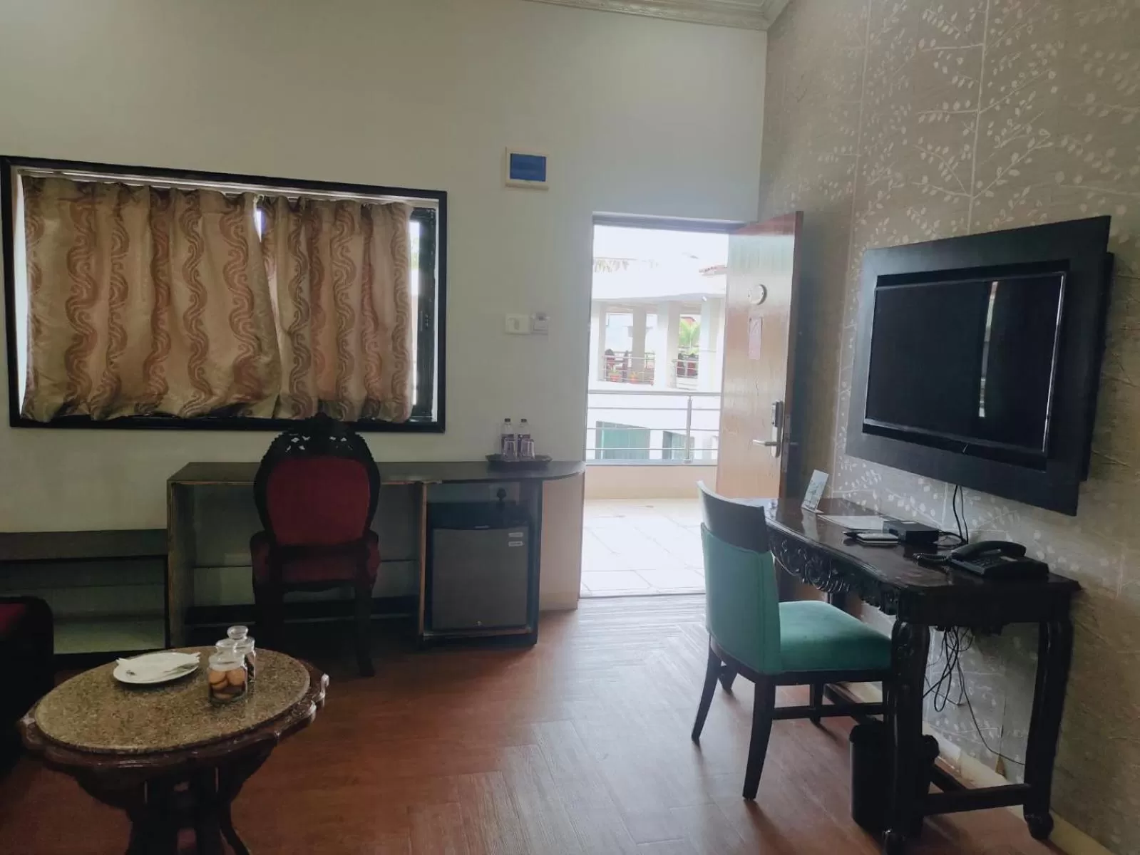 Living room in The Center Court Resort & Spa