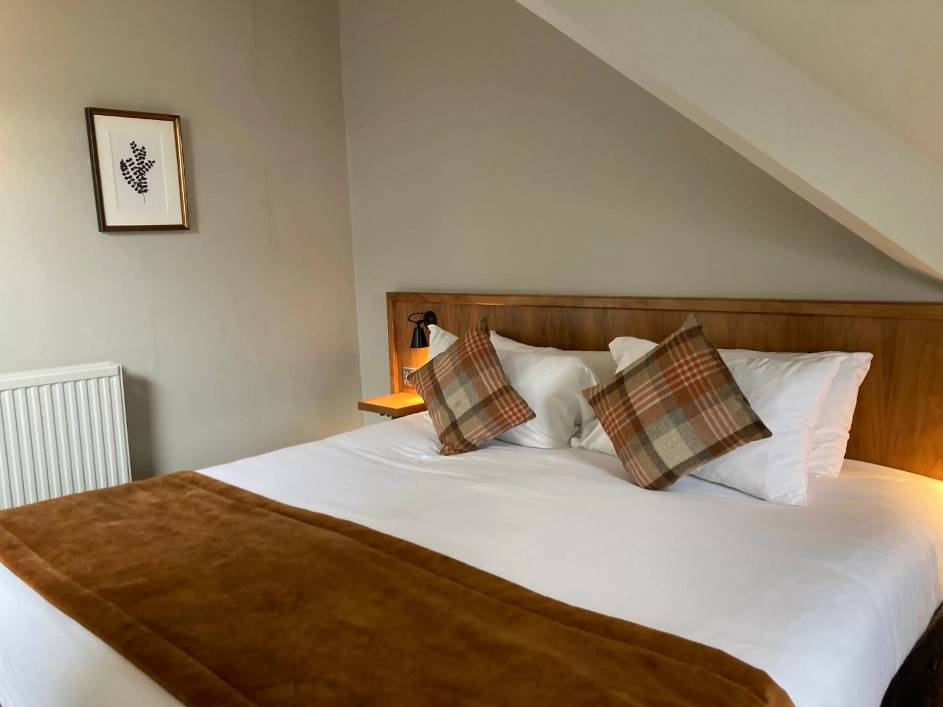 Bed in The Cross-Keys Hotel