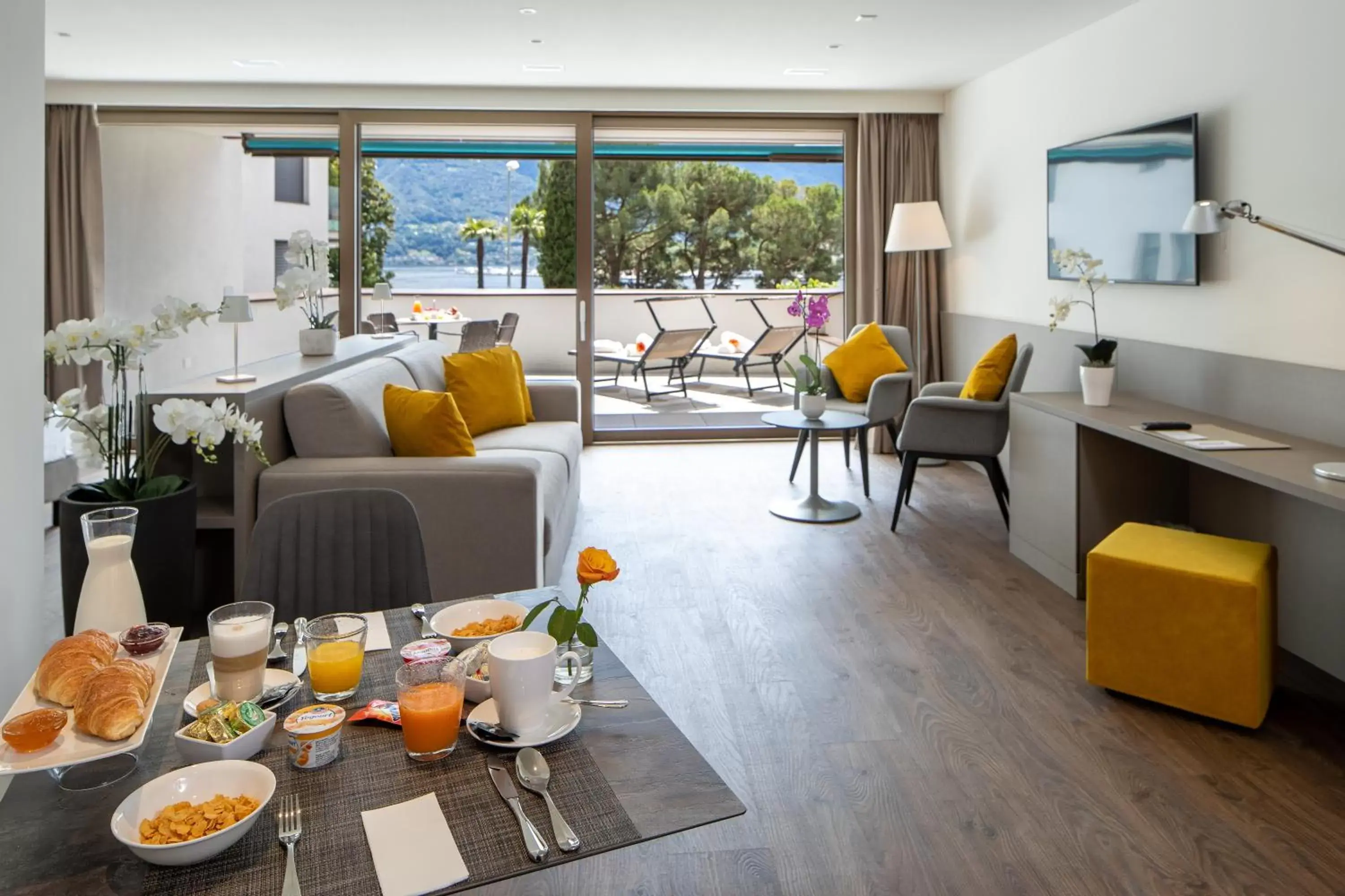 Junior Suite with Partial Lake View - First Floor with Disability Access in Hotel Lago Maggiore - Welcome! Junior Suite with Partial Lake View - First Floor with Disability Access in Hotel Lago Maggiore - Welcome!