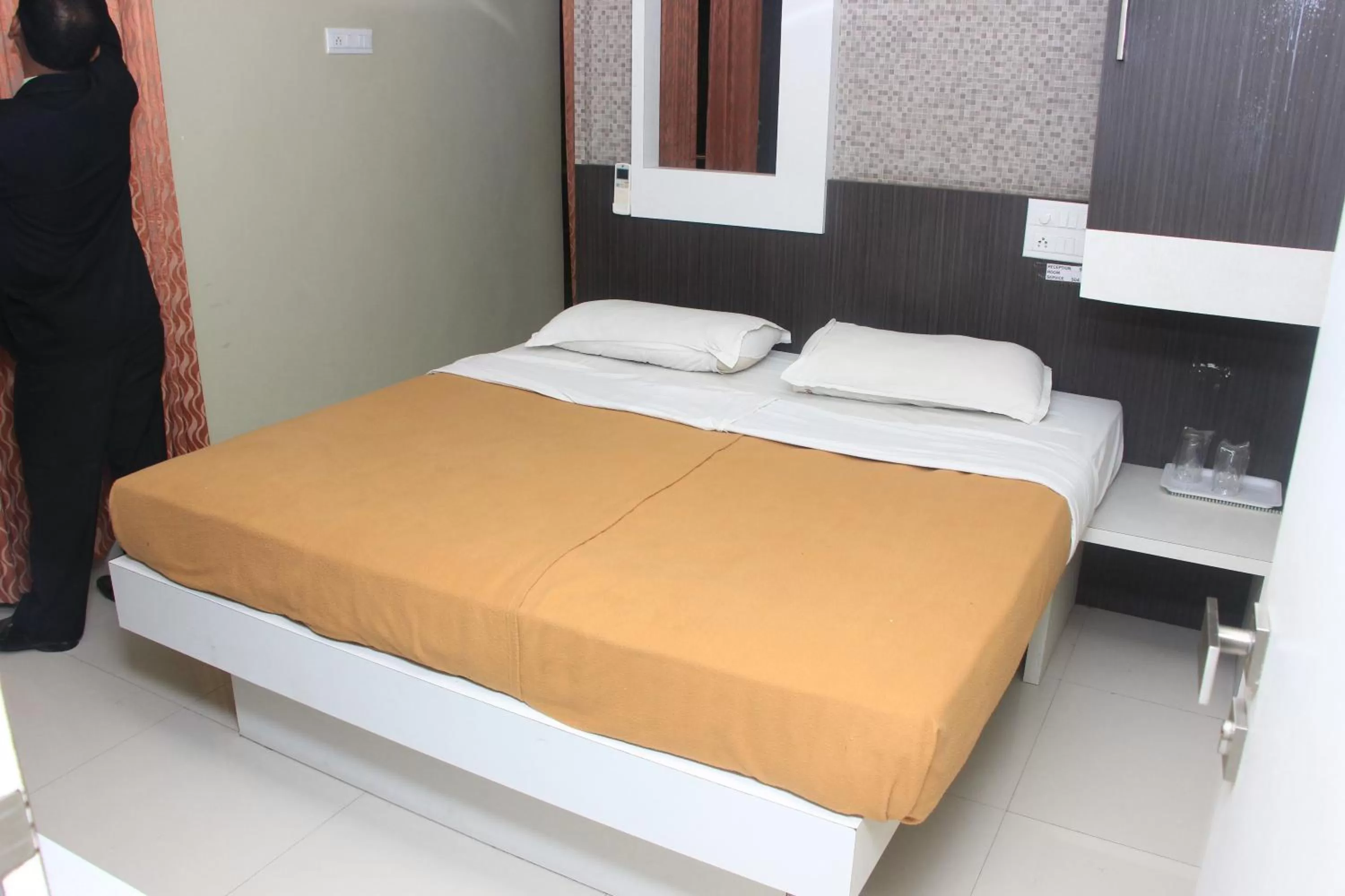 Bedroom in Hotel Sham Suman, Kolhapur- Opposite To Mahalaxmi Temple