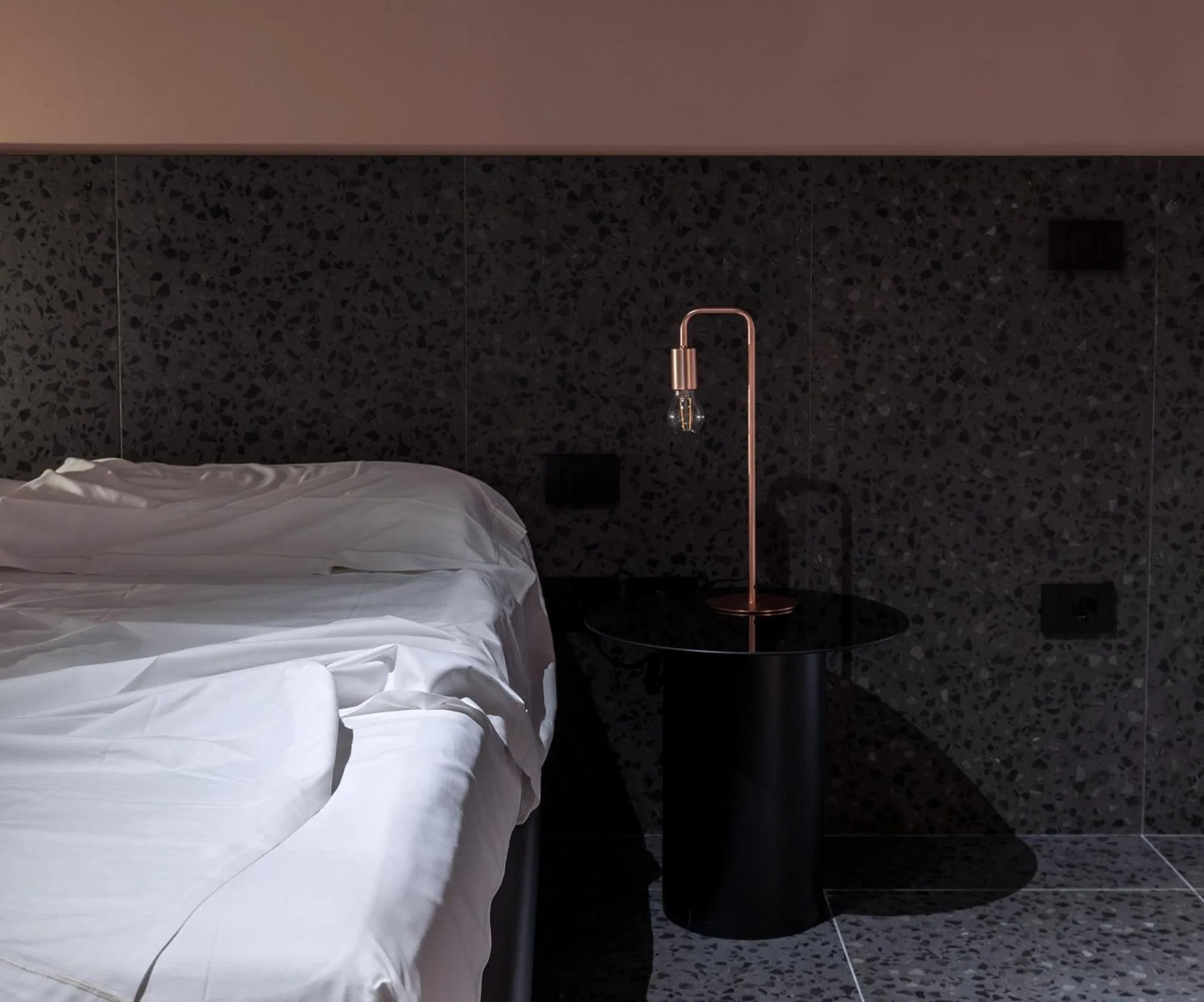 Bed in Elide Design Hotel