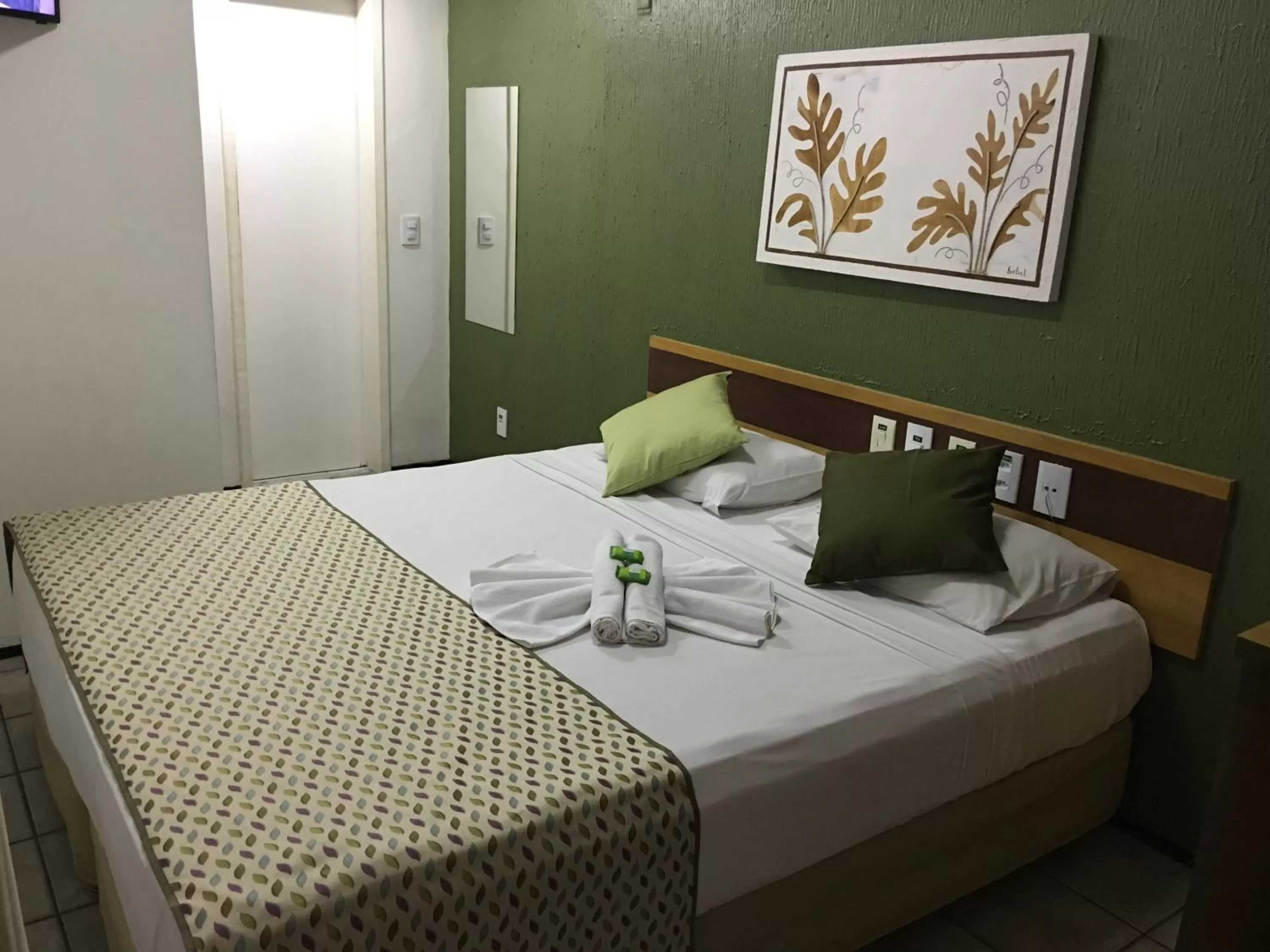 Photo of the whole room, Bed in Abrolhos Praia Hotel