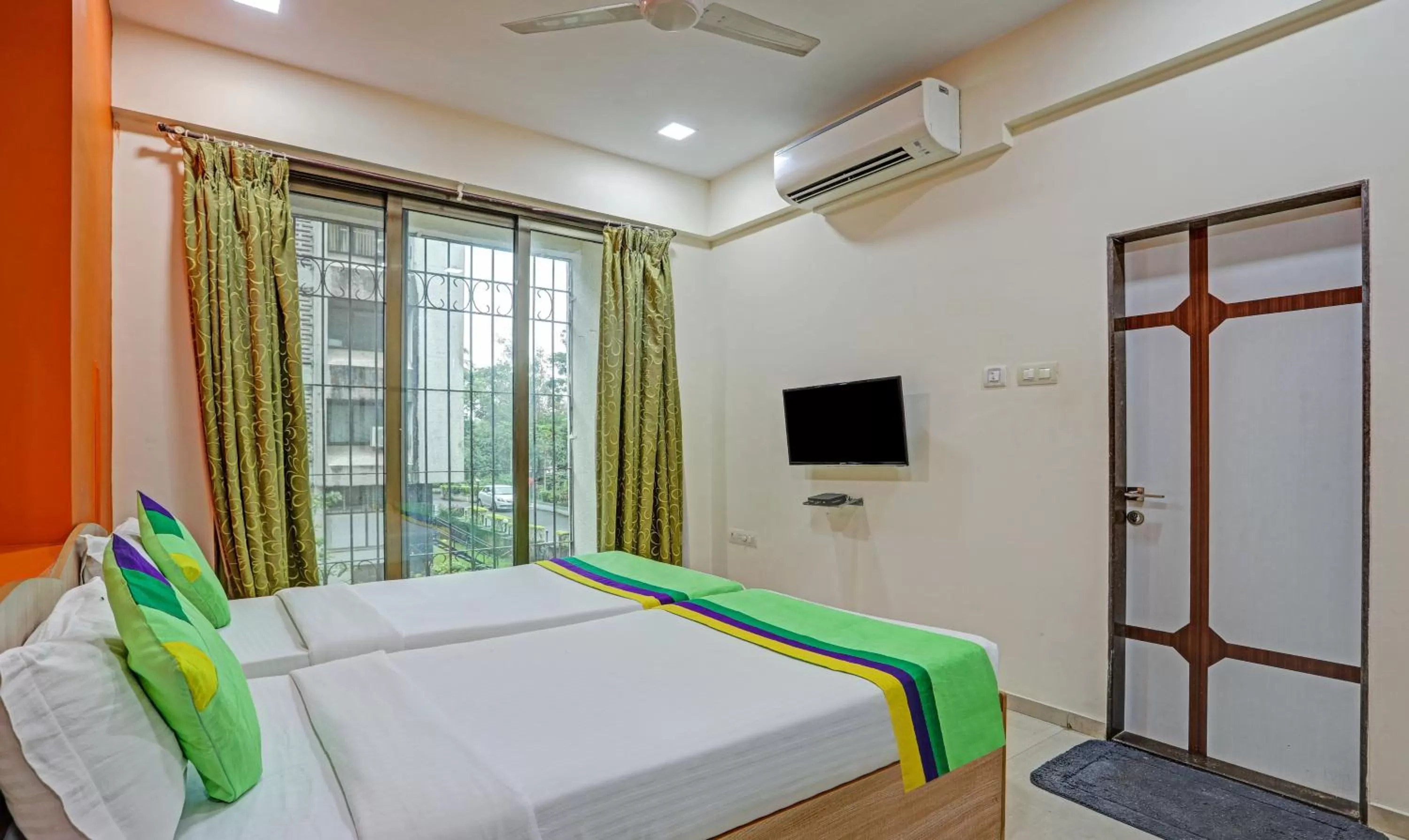 Bed in Treebo Trend Welcome Apartments