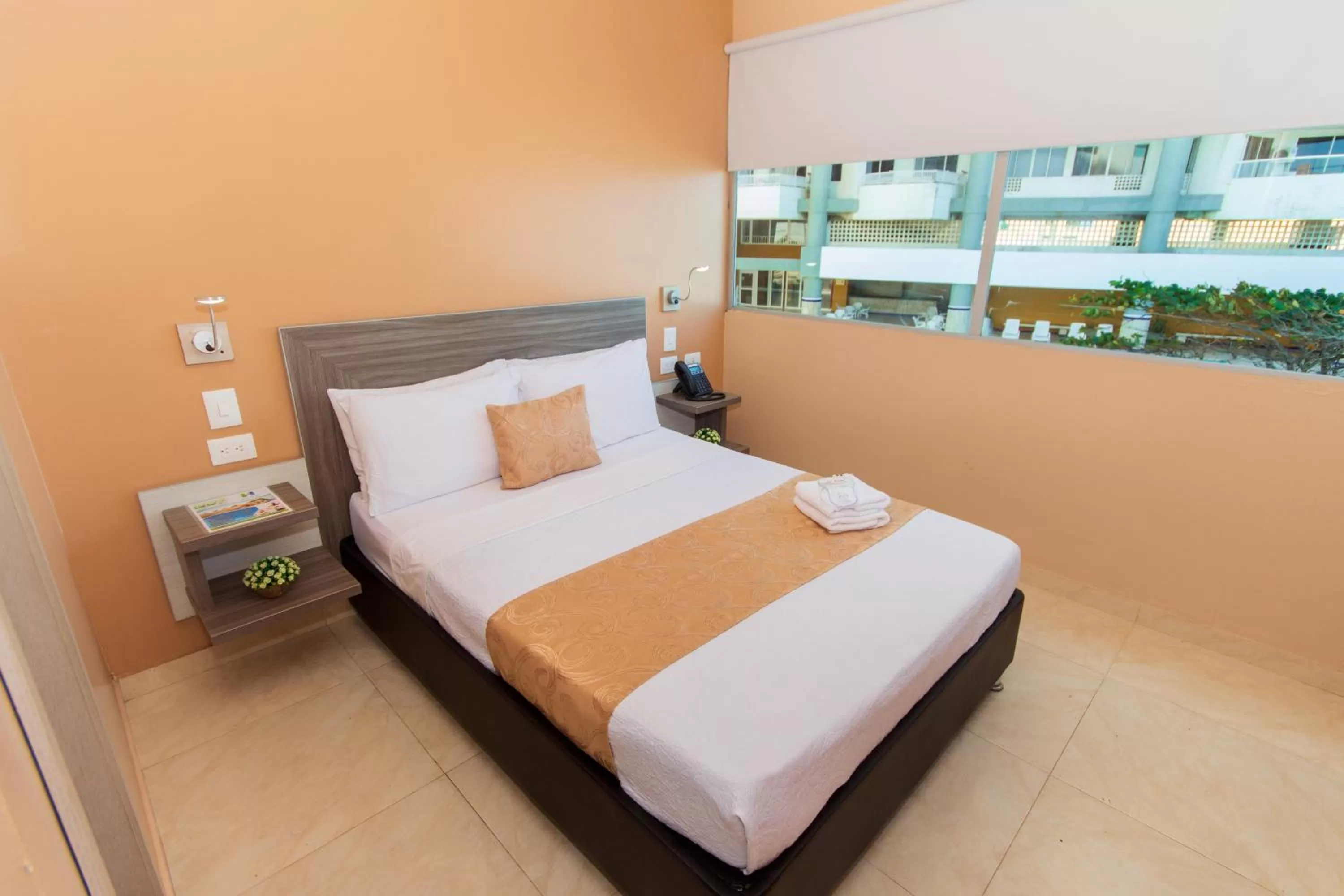 Bedroom in Hotel Aixo Suites By GEH Suites