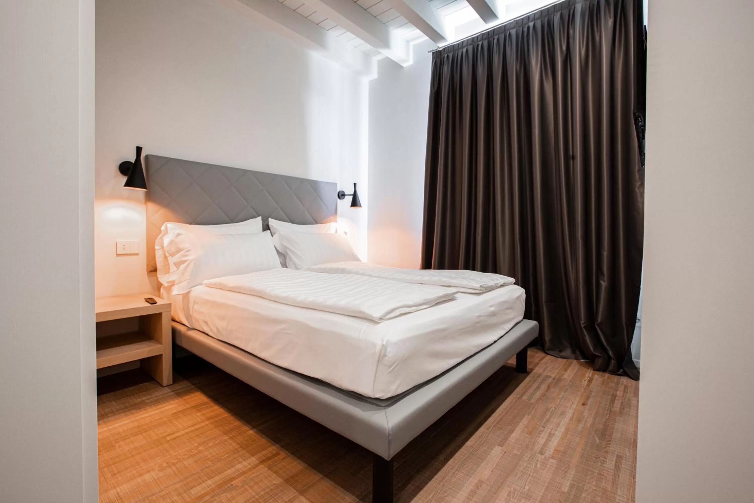 Bed in Ah Villaglori Boutique Apartments