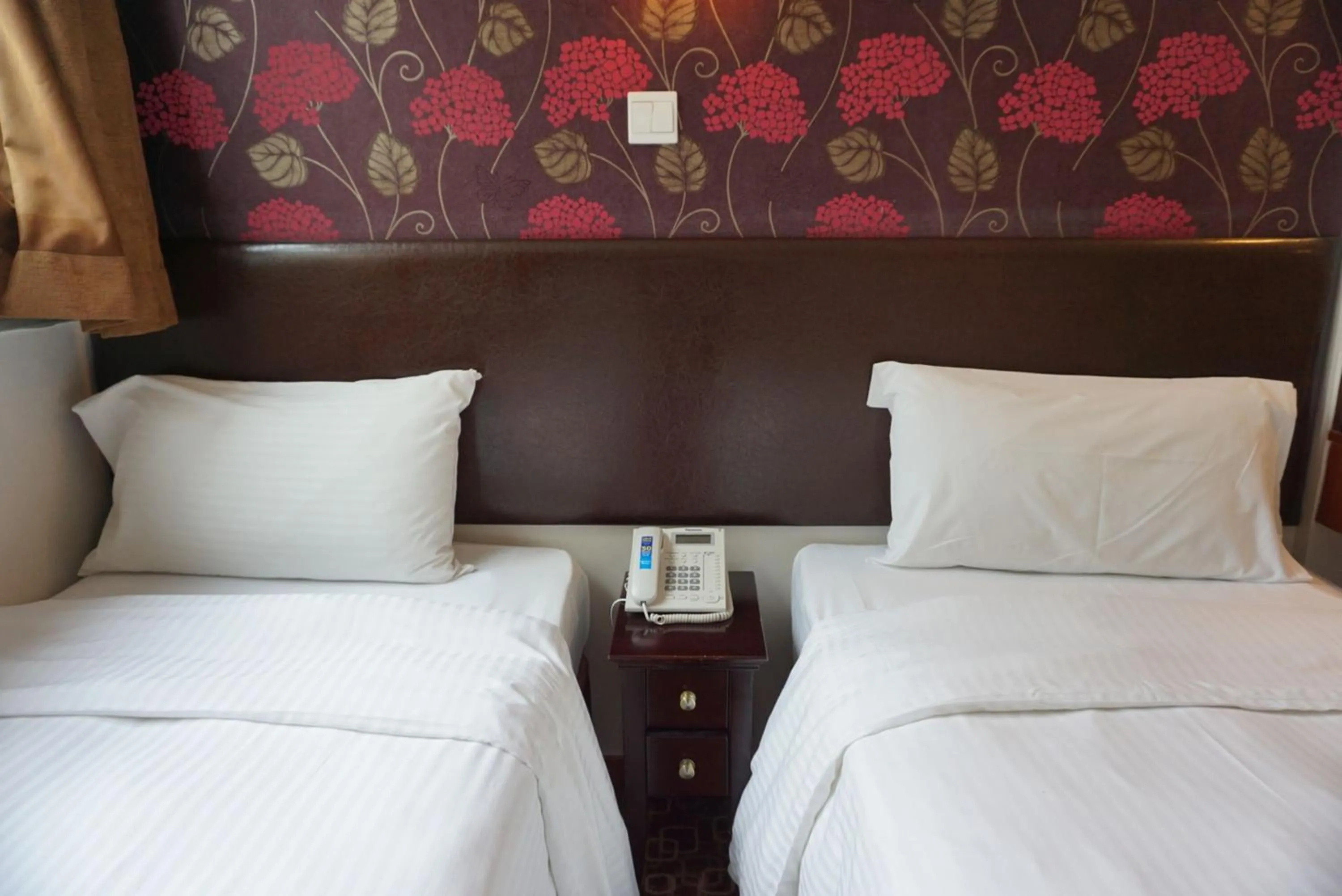 Bed in Lander Hotel Prince Edward