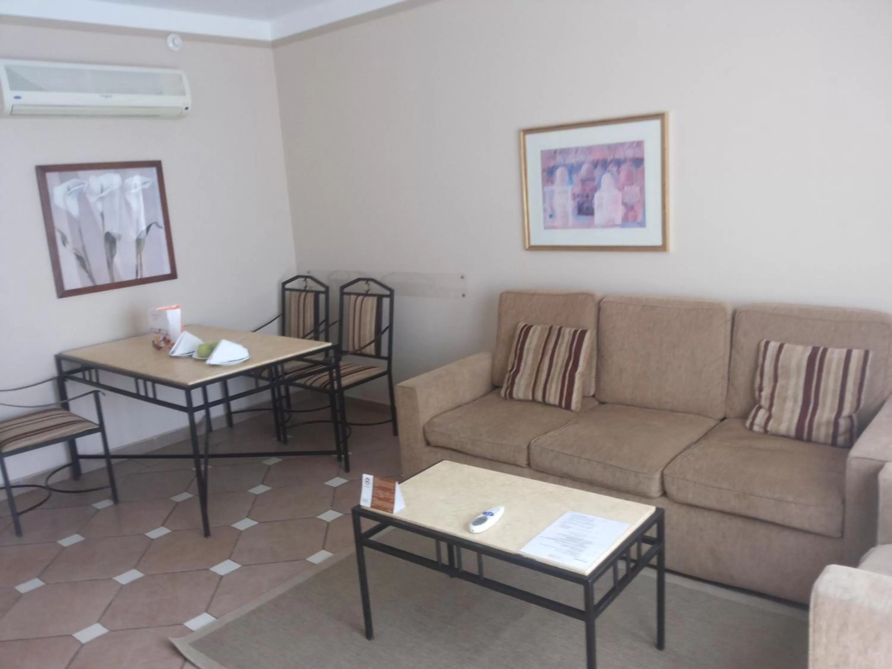 Seating area in Solymar Ivory Suites