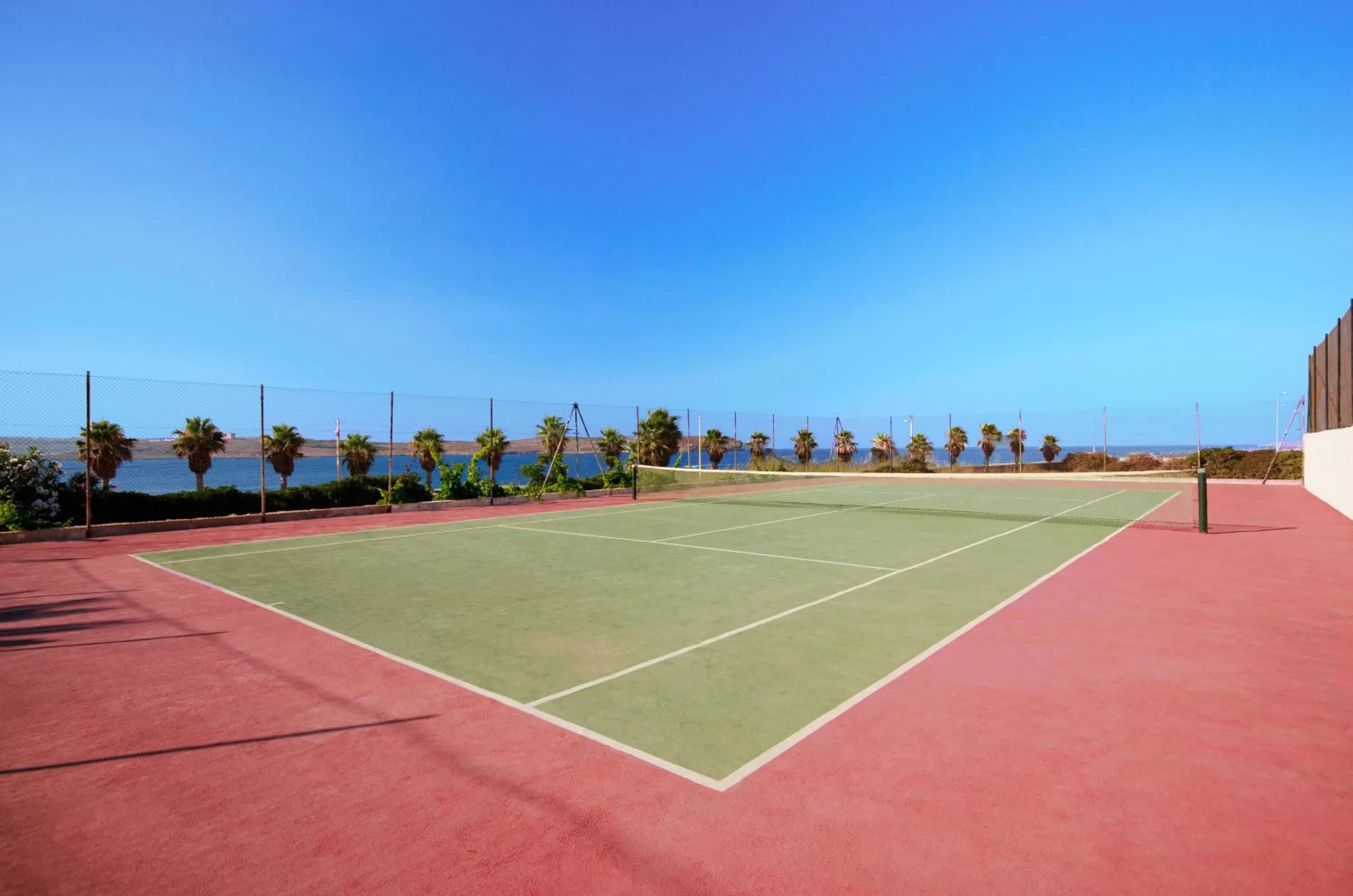 Tennis court in Paradise Bay Resort