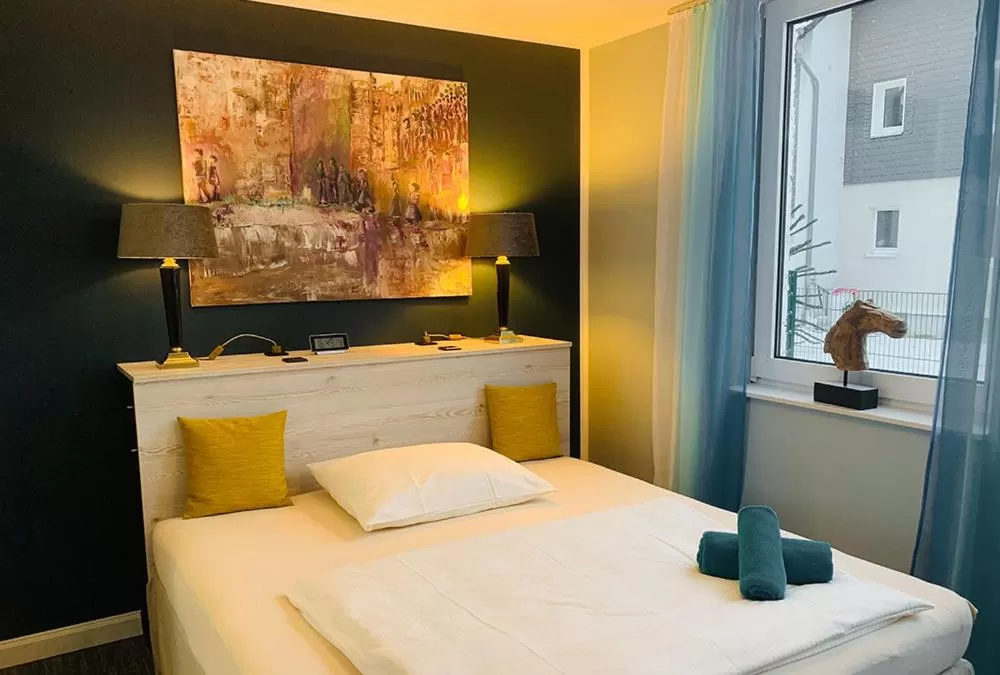 Bed in BESOTEL Mettmann