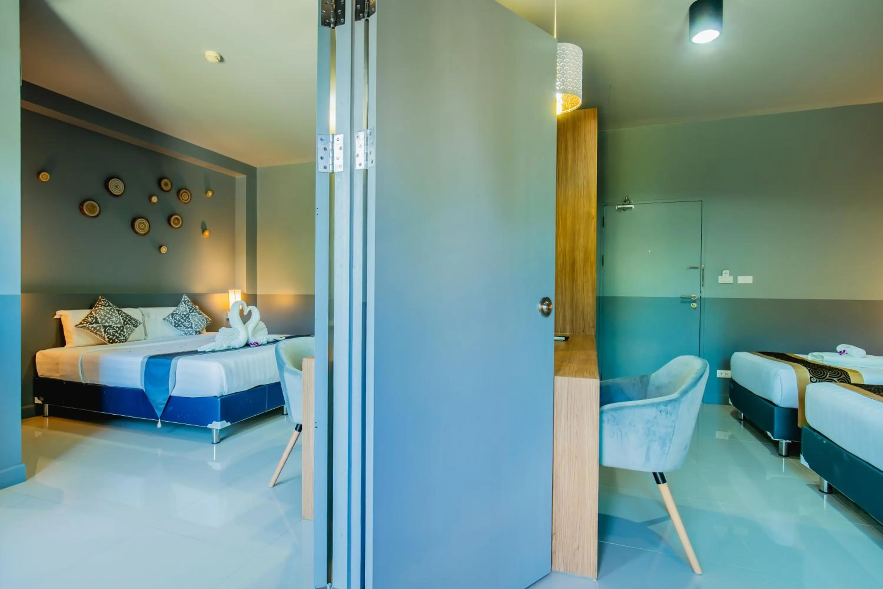 Photo of the whole room, Bed in The Rubber Hotel Phuket