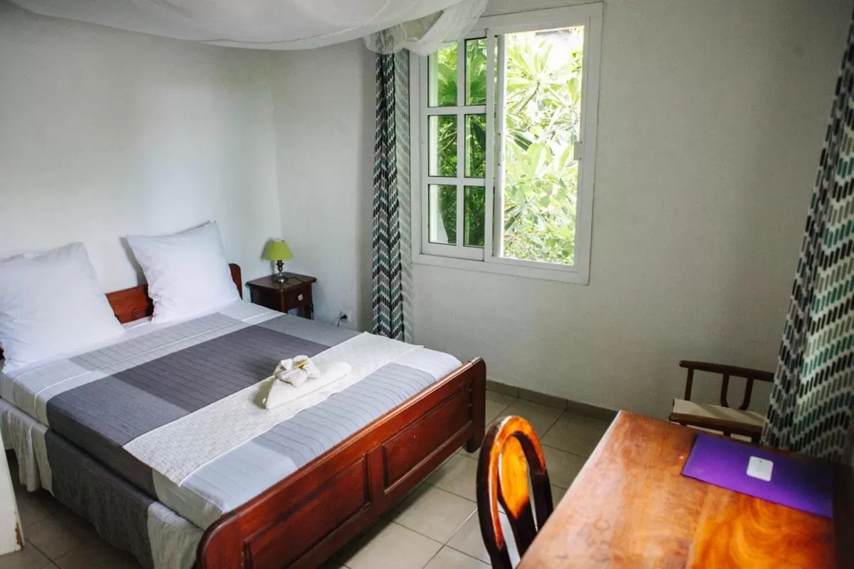 Bedroom, Bed in Hotel Jardin de la Paix