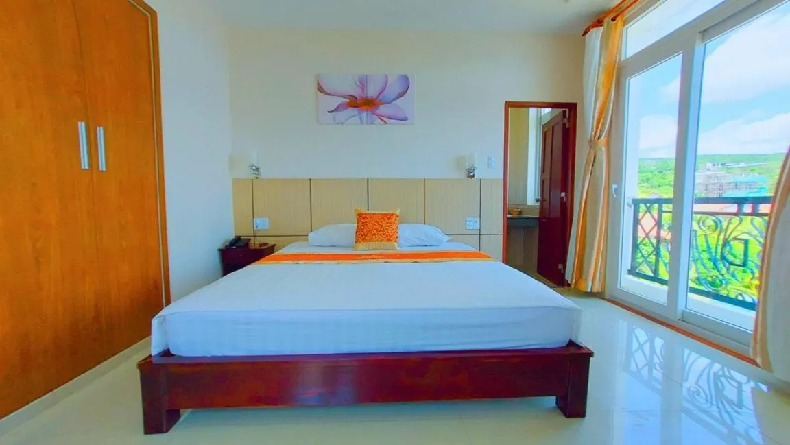 Bed in Victoria Phu Quoc hotel Beachfront Night market