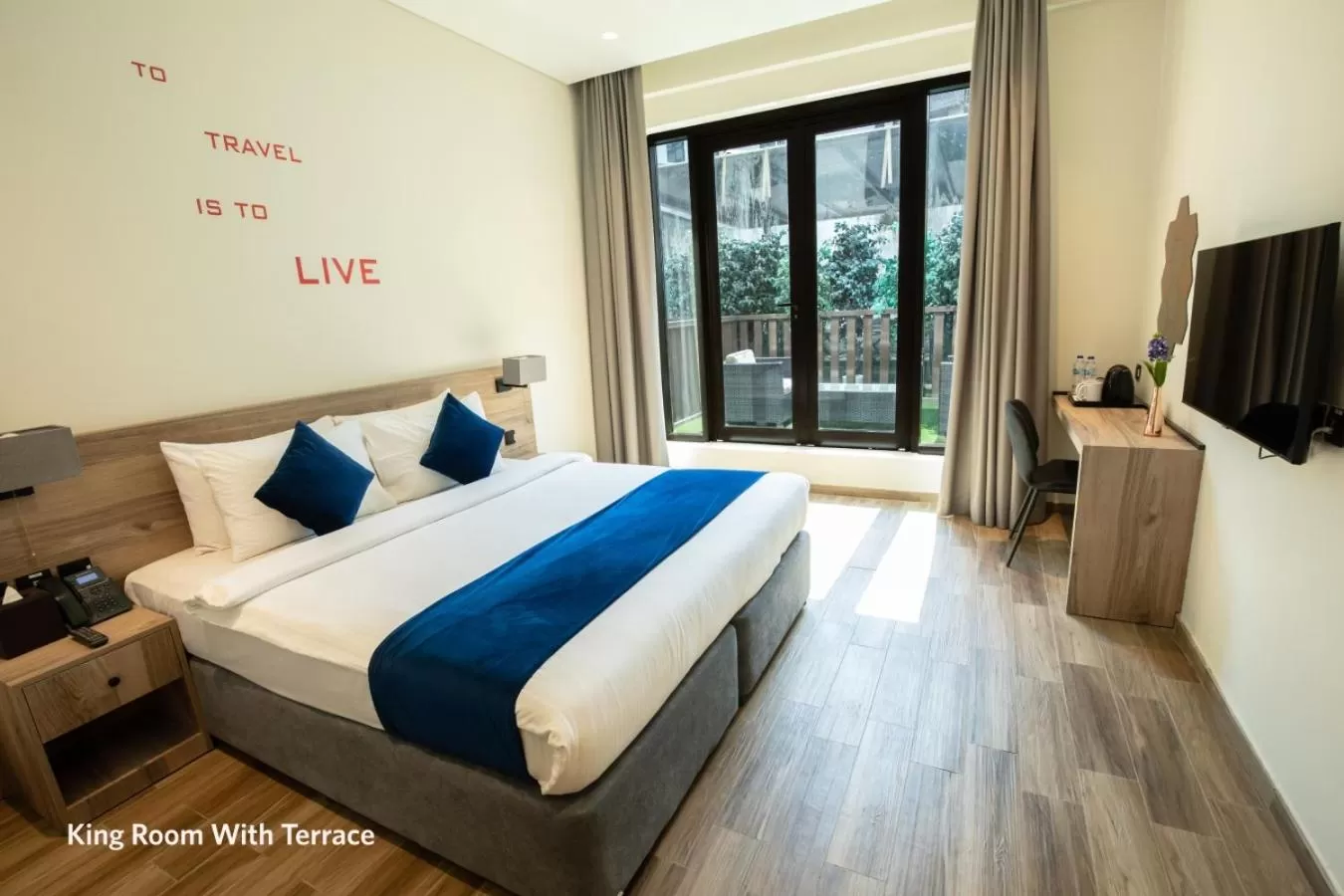 Balcony/Terrace, Bed in Grand Kingsgate Jaddaf Waterfront Hotel by Millennium