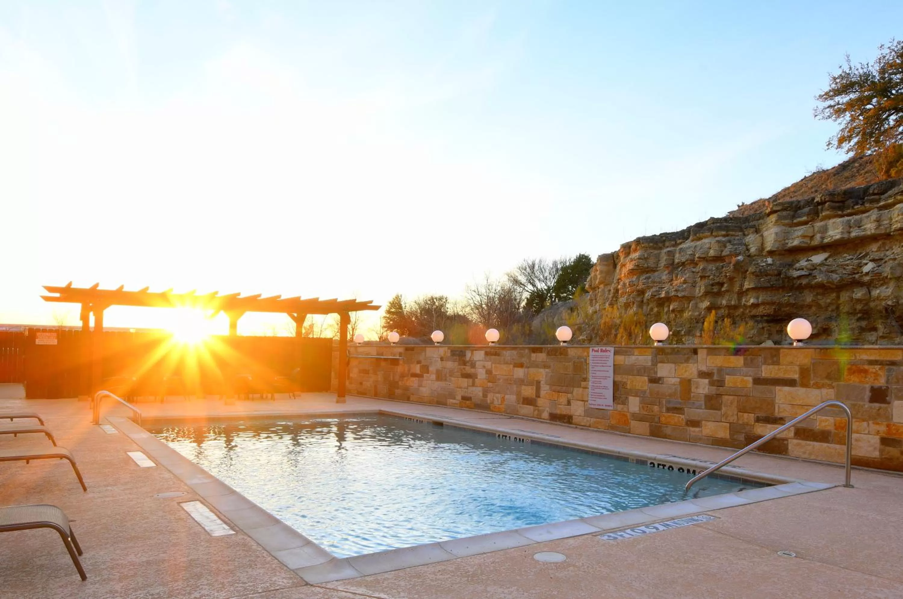 Swimming pool in Baymont Inn & Suites by Wyndham Glen Rose