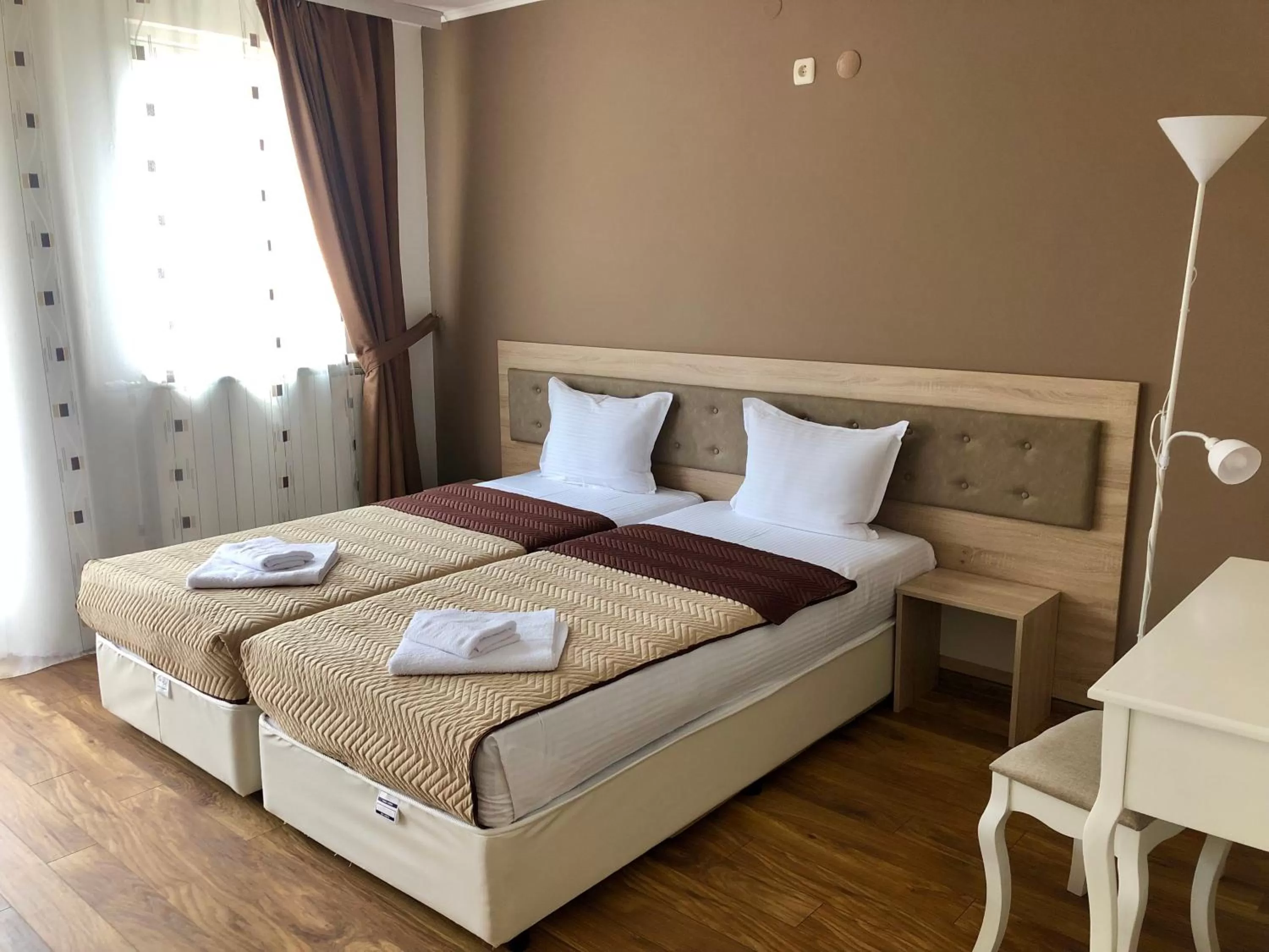 Bed in Family Hotel Ring & Thermal