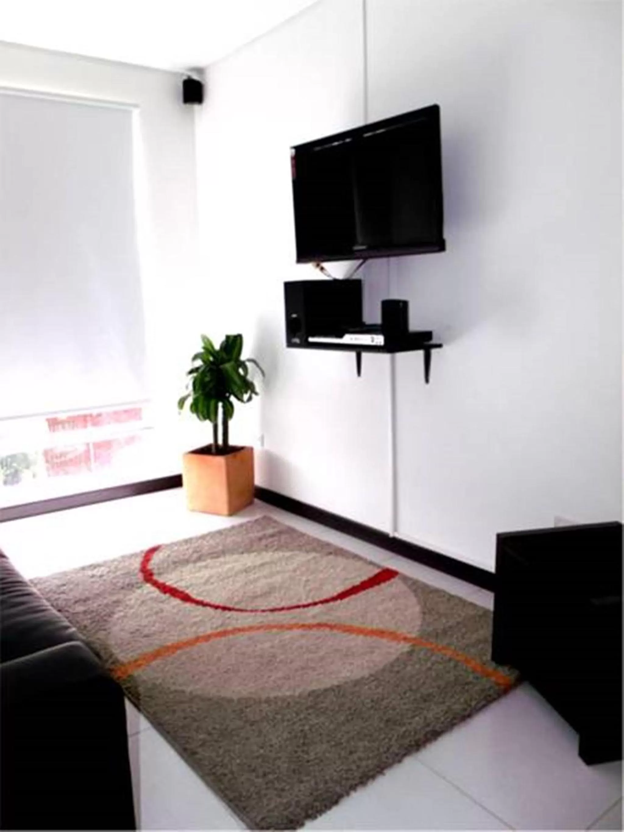 Living room in Apartasuites San Marcos