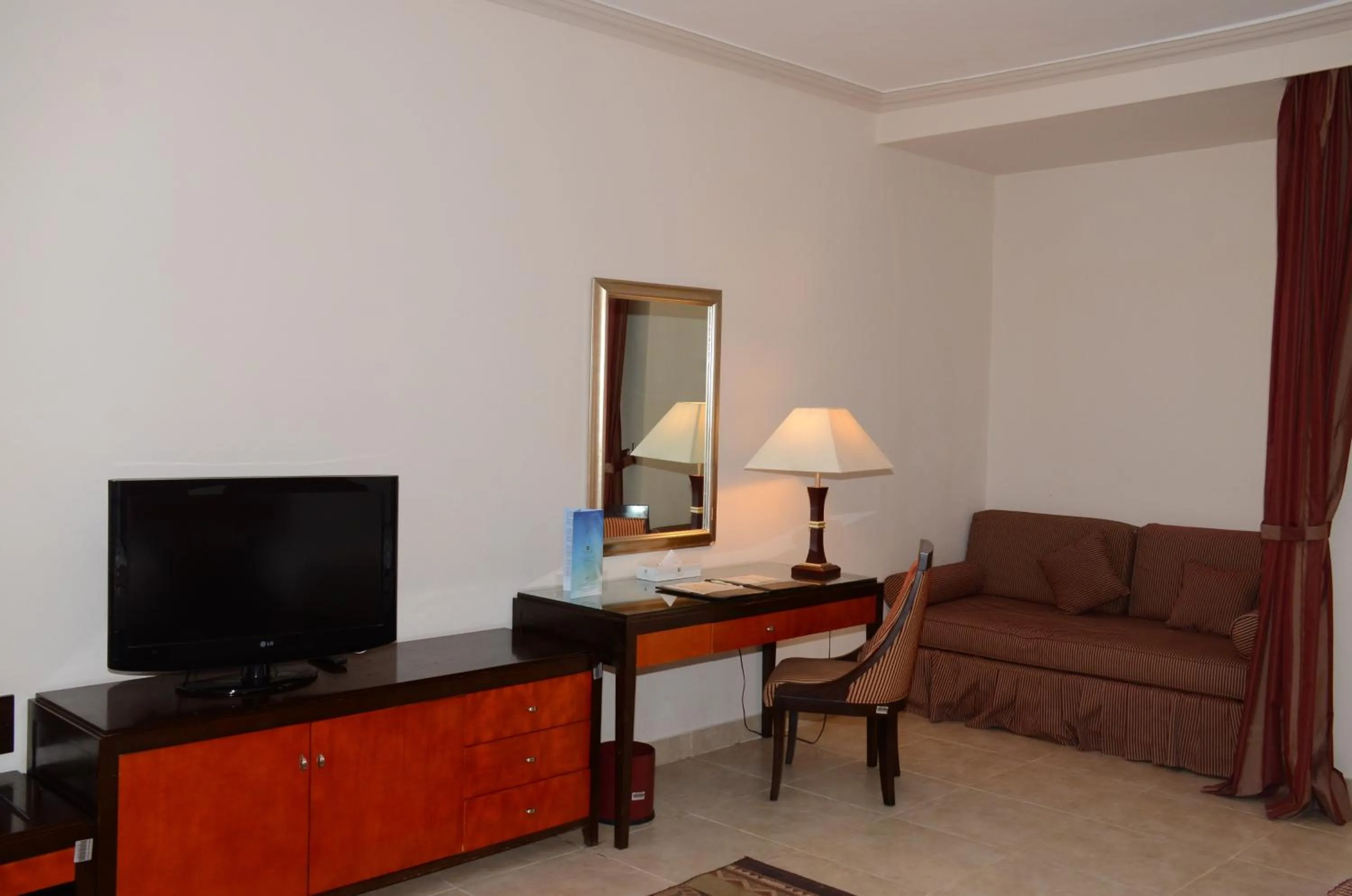 TV and multimedia in Rehana Royal Beach Resort - Aquapark & Spa - Family & Couples Only - Premium Ultra All-Inclusive 24H