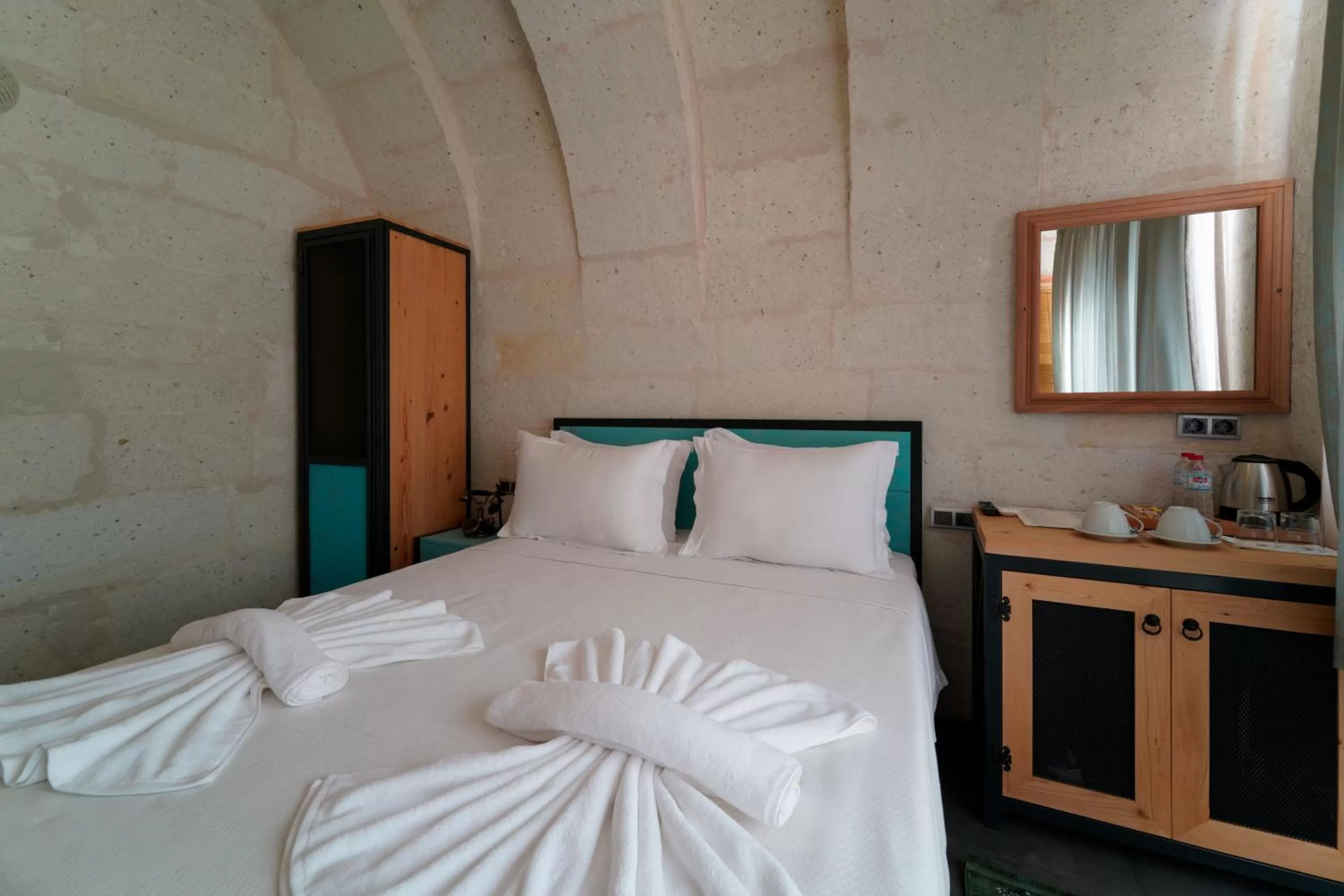 Bed in The Niche Cave Hotel