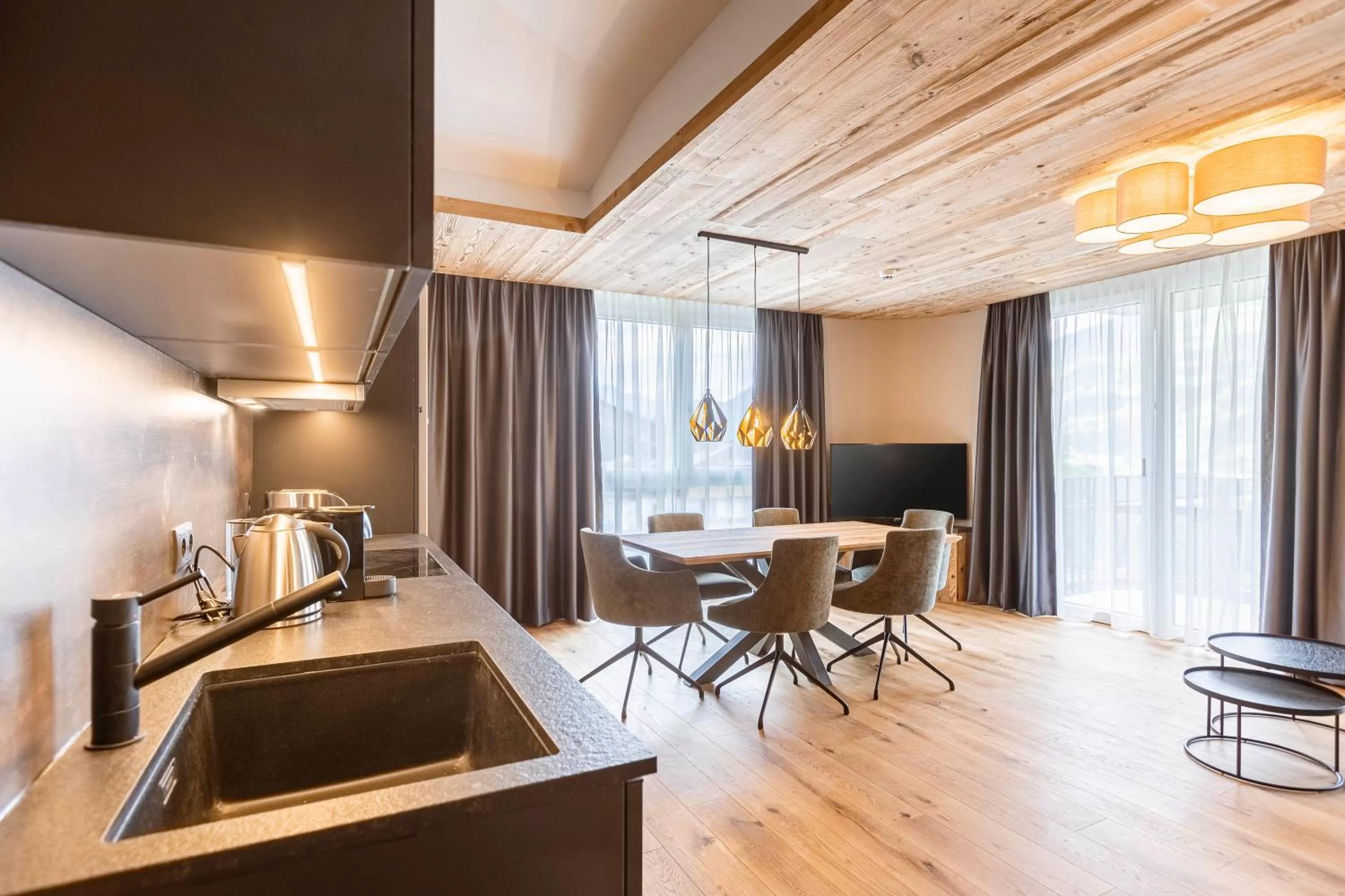 Kitchen or kitchenette in Zillertal Suites Fügen by ALPS RESORTS