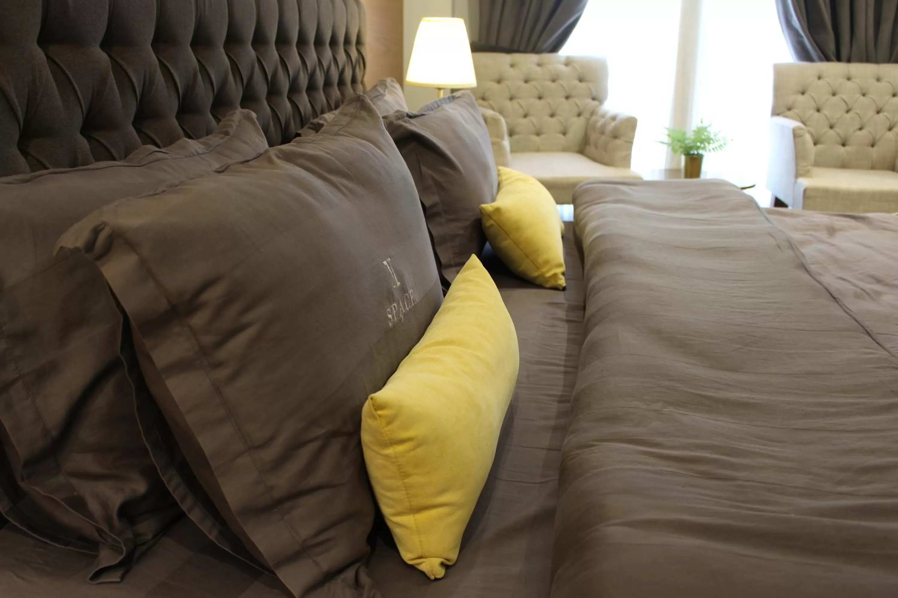 Bed in SPACE Luxury Rental Suites