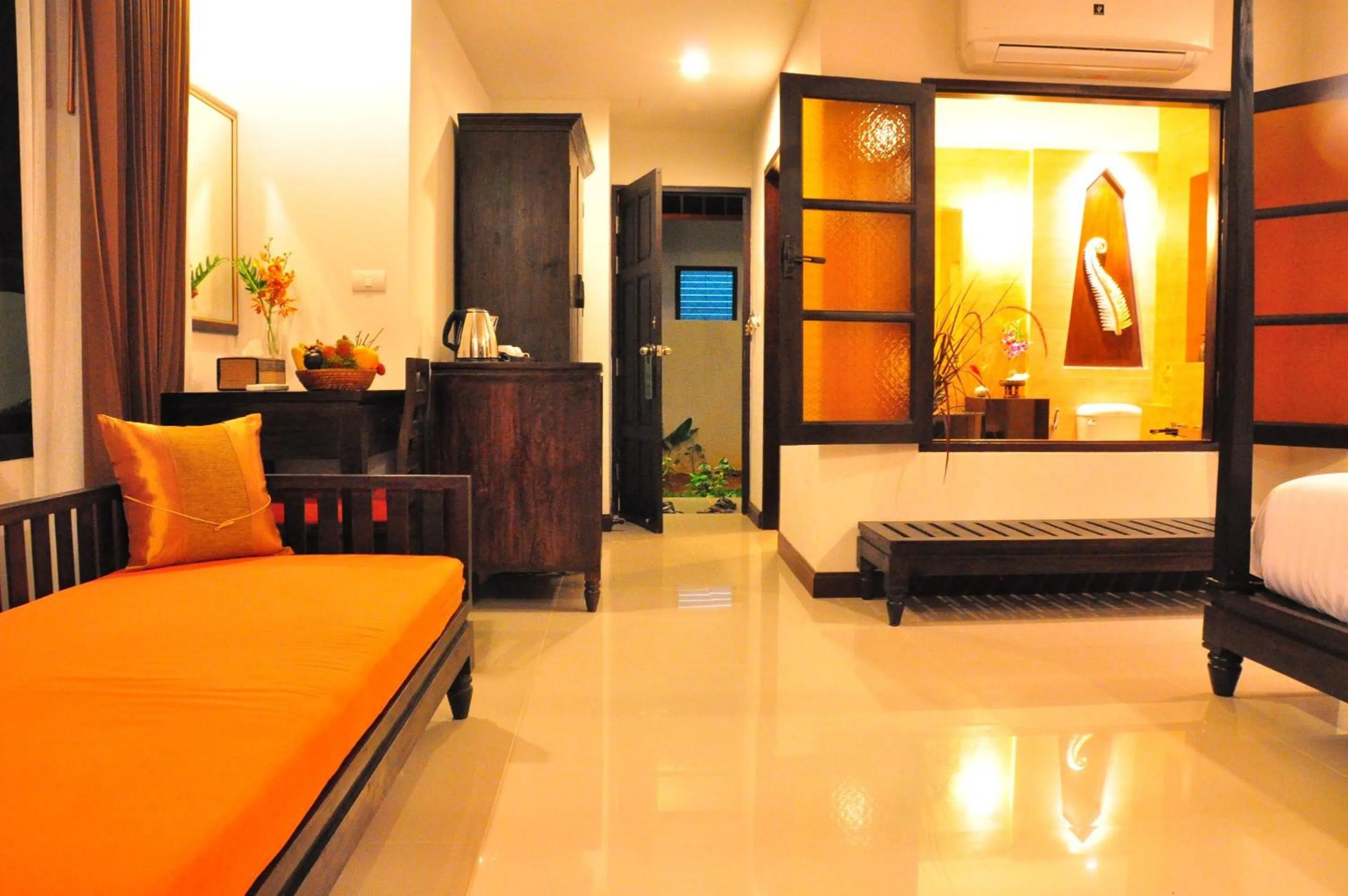 Seating area, Bed in Navatara Phuket Resort