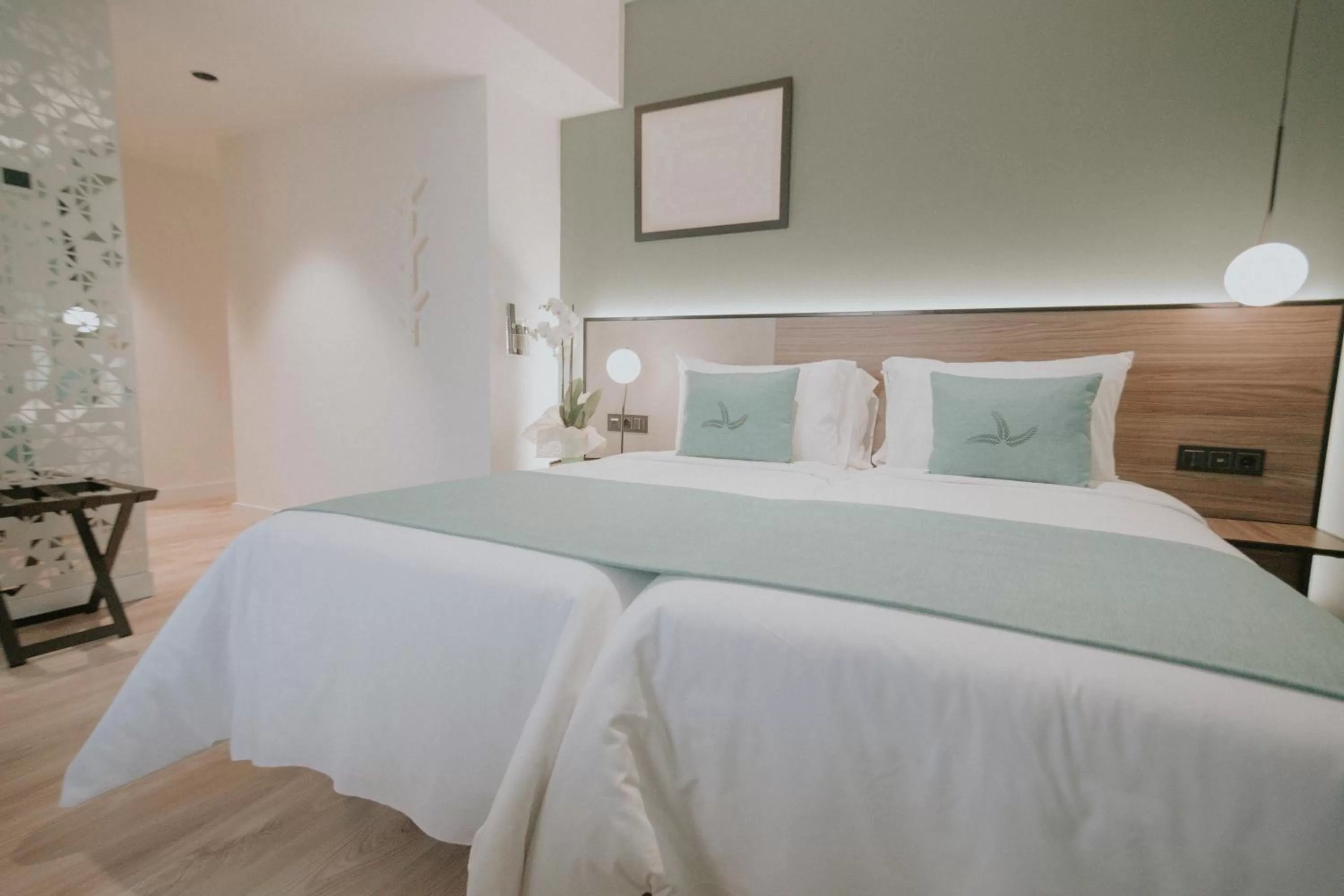 Bed in Catalina Plaza Hotel Sostenible