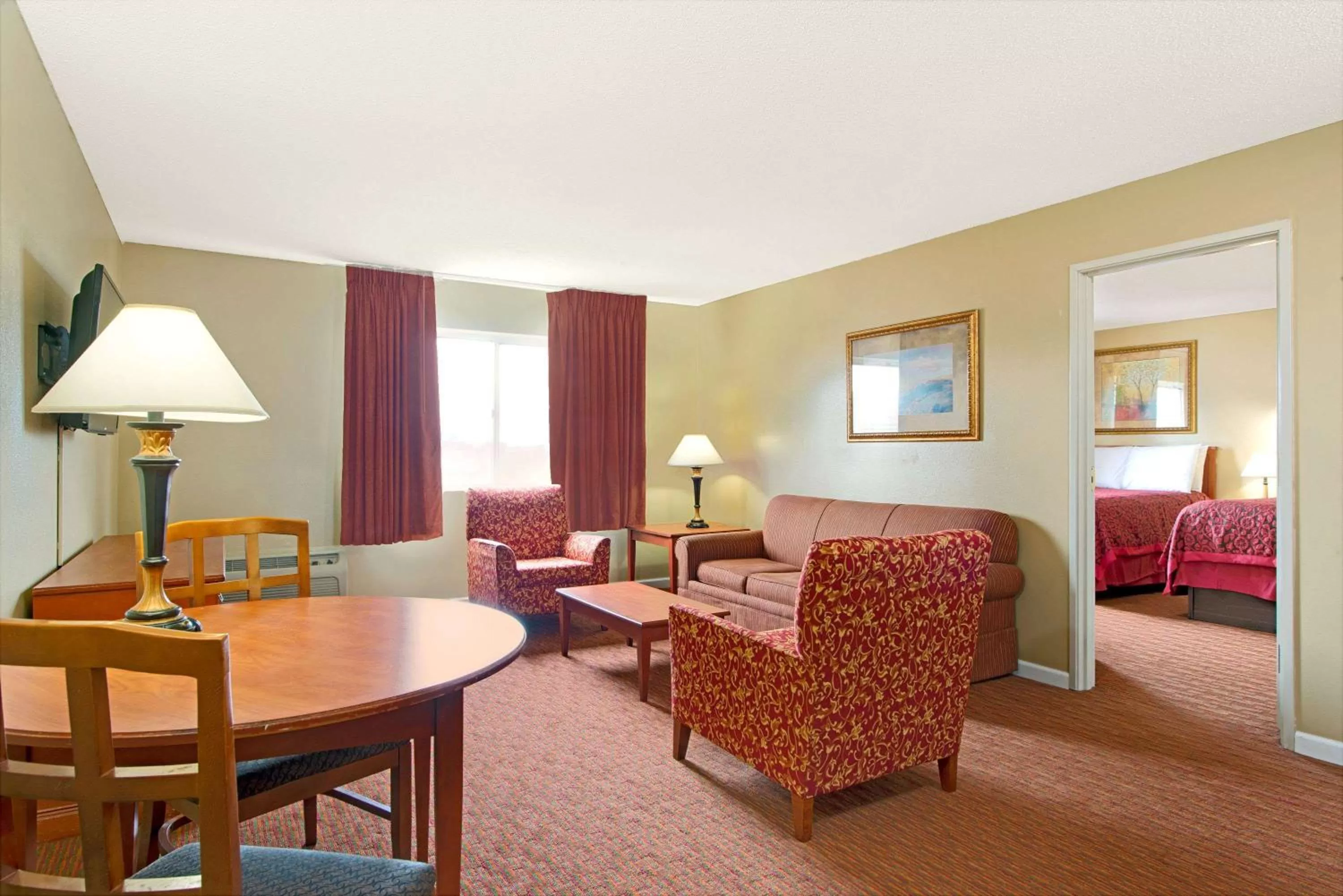 Photo of the whole room, Bed in Days Inn by Wyndham St. Louis/Westport MO