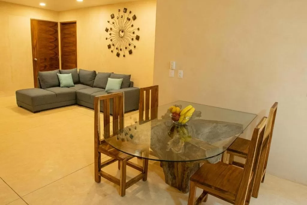Living room, Dining Area in Azul Tulum by GuruHotel