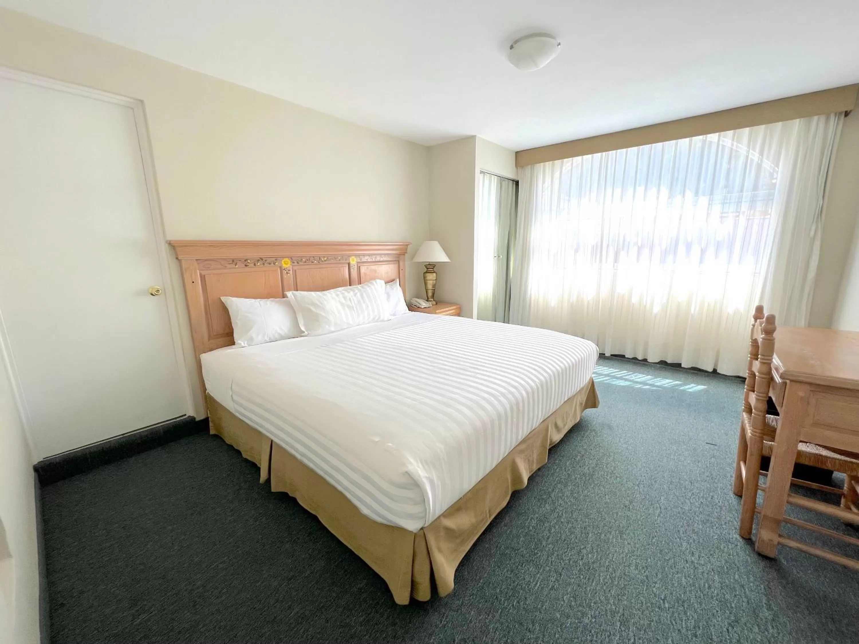 View (from property/room), Bed in Biohotel Boutique Metepec