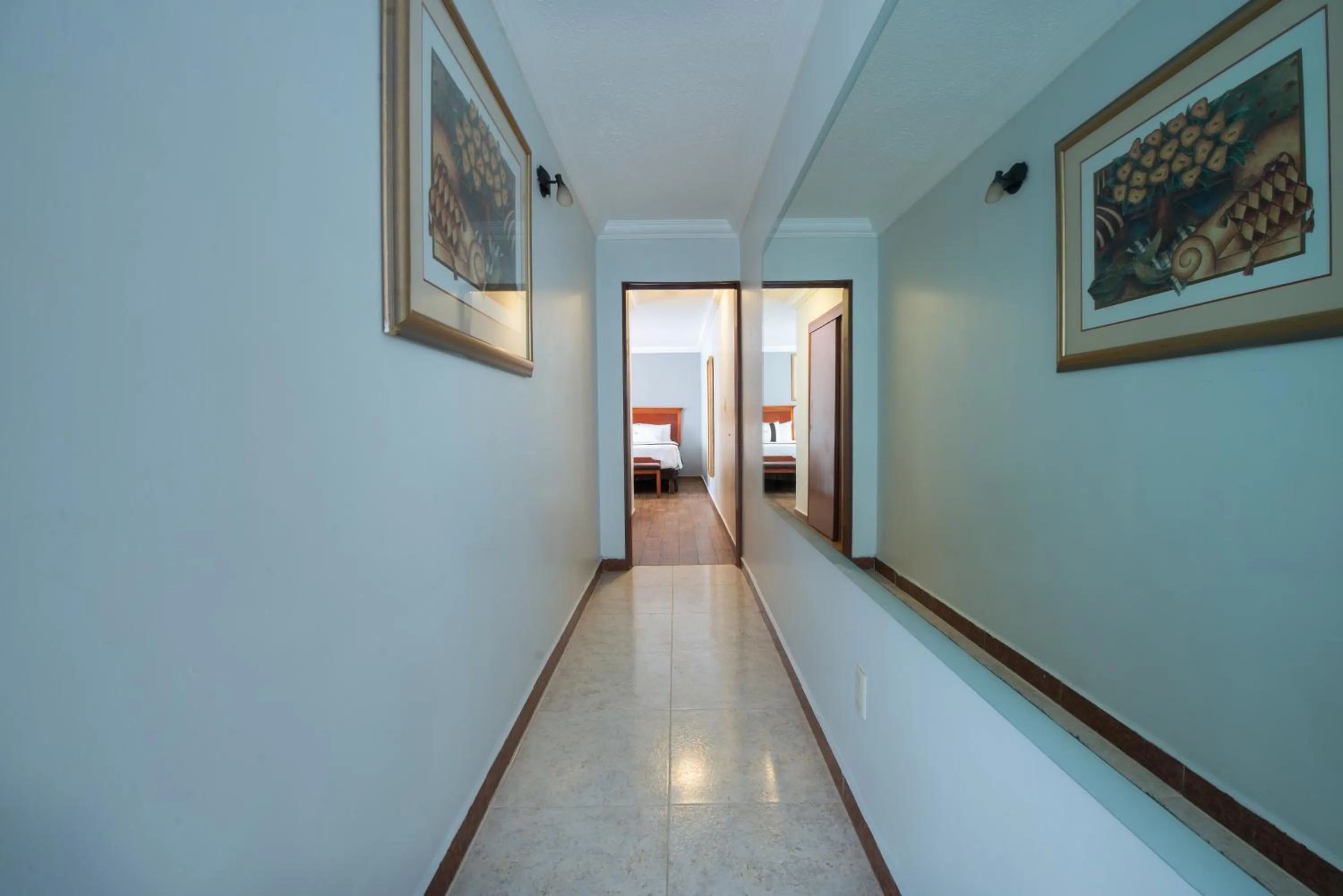 Bed in Del Marques Hotel and Suites