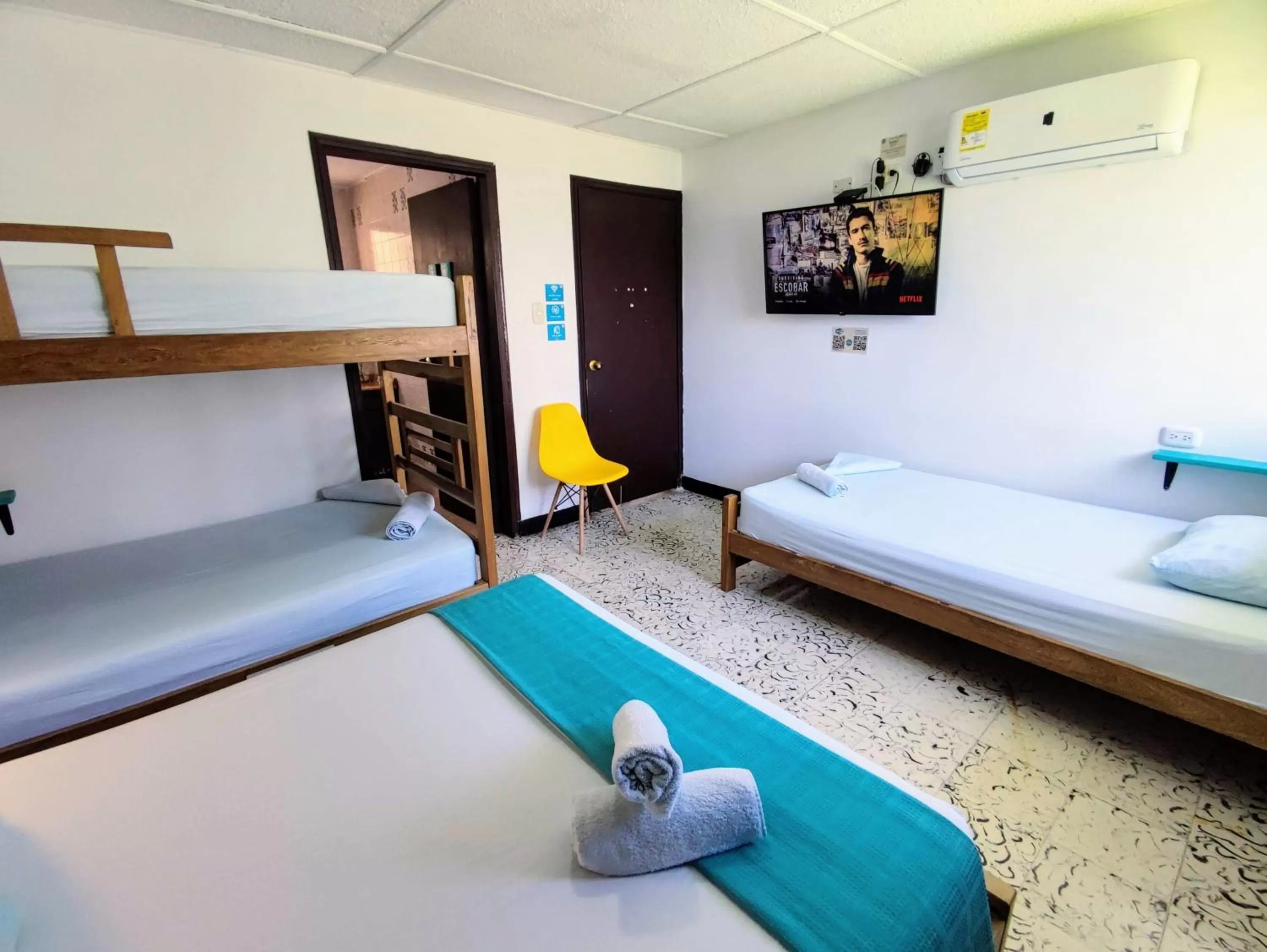 Bed in Bona Vida Hotel