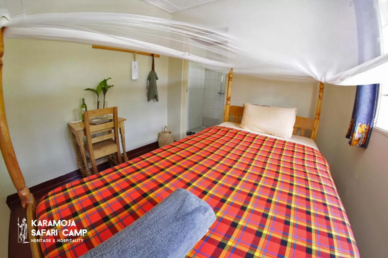 Bed in Kara-Tunga Safari Camp