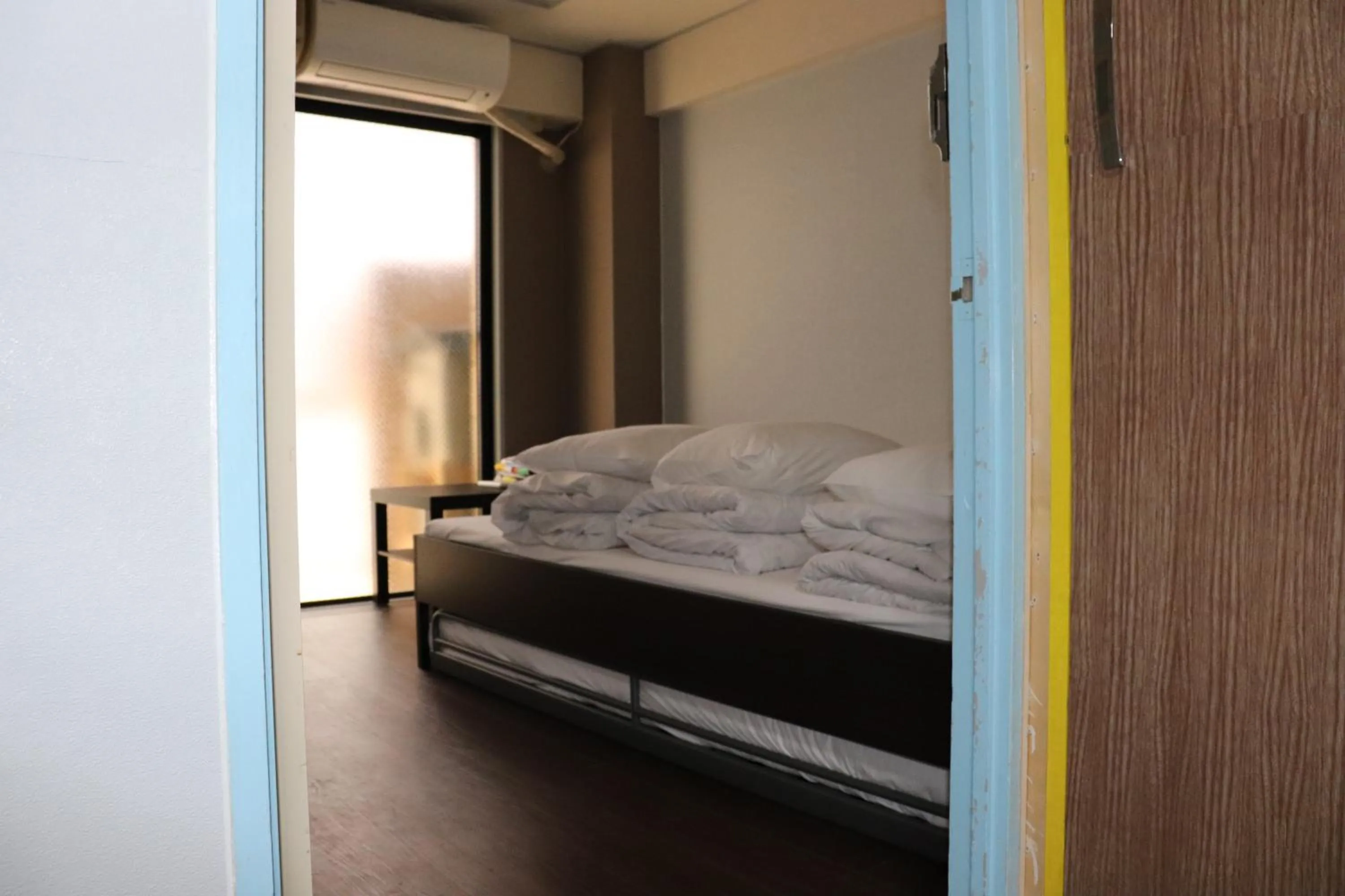 Bed in Sophiearth Apartment