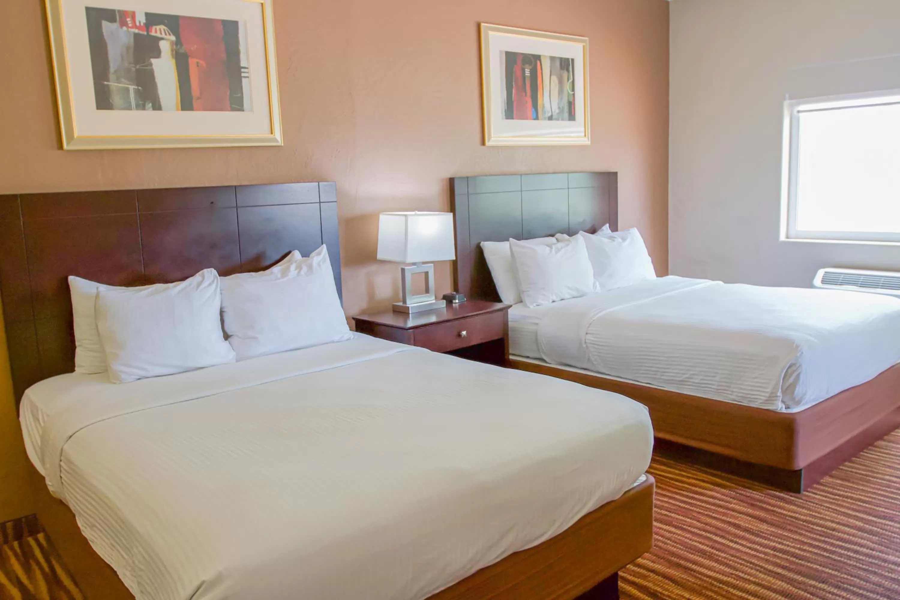 Bed in First Choice Inn at the Swell