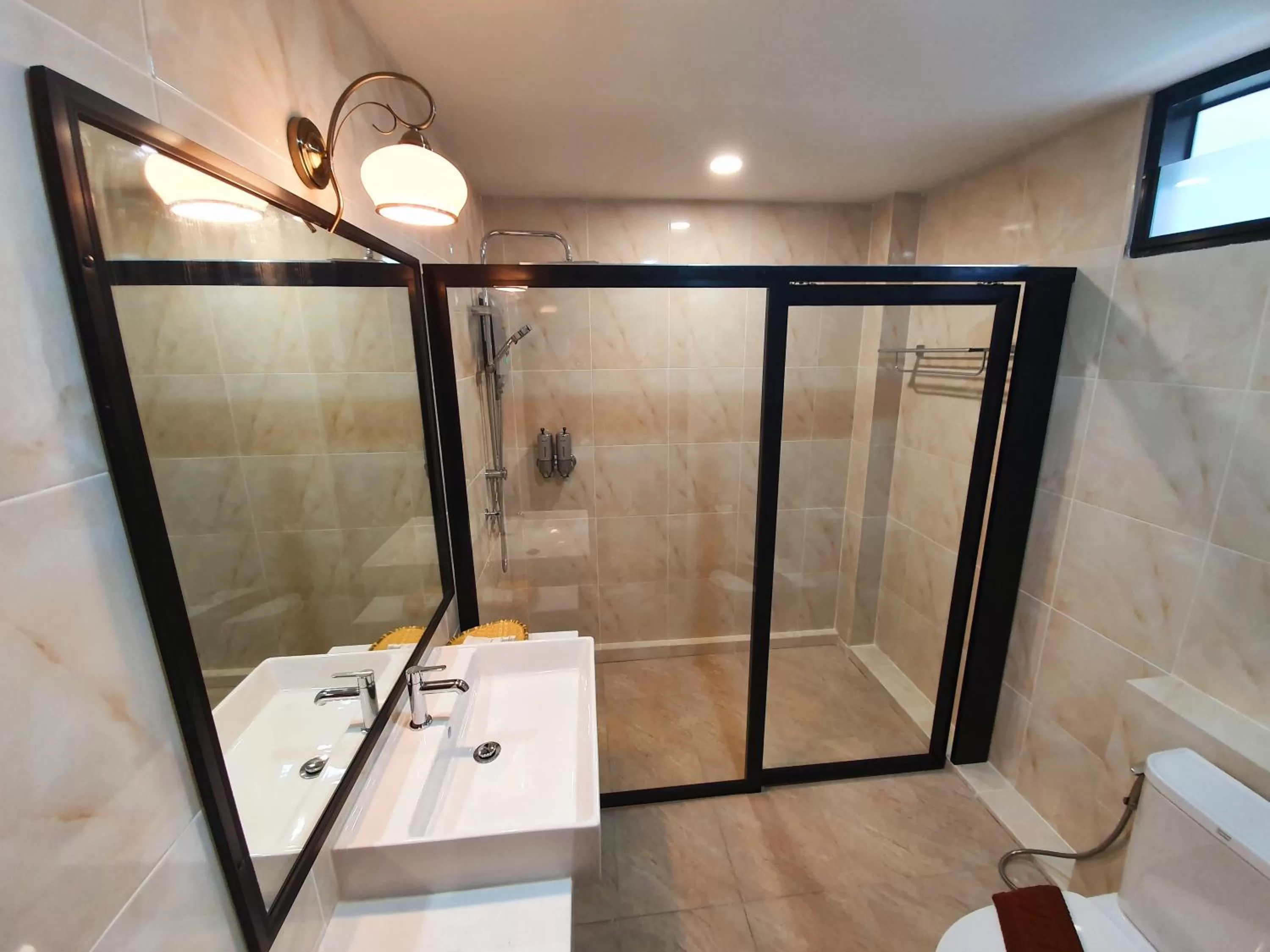Shower in USABAI Riverside Boutique Hotel