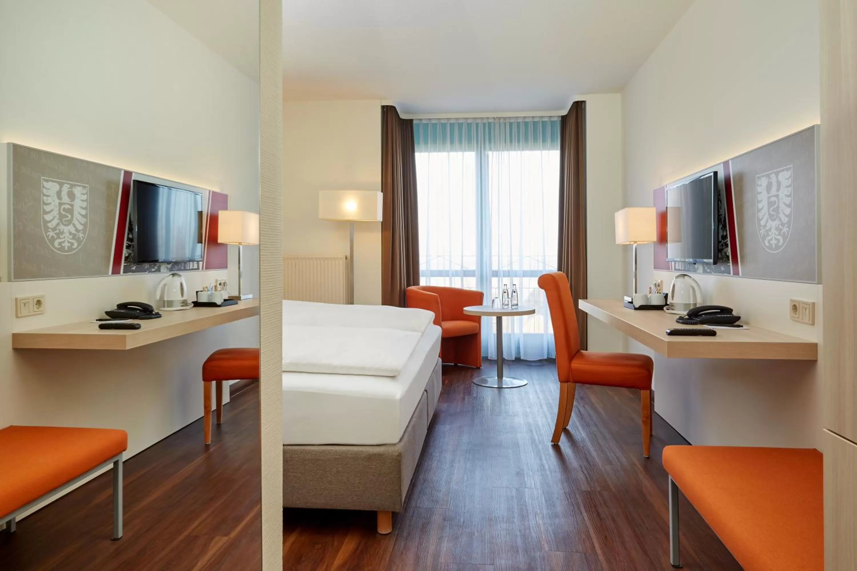 Bedroom, Bed in H+ Hotel Limes Thermen Aalen