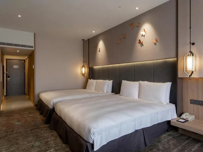 Bed in The Howard Prince Hotel Taichung