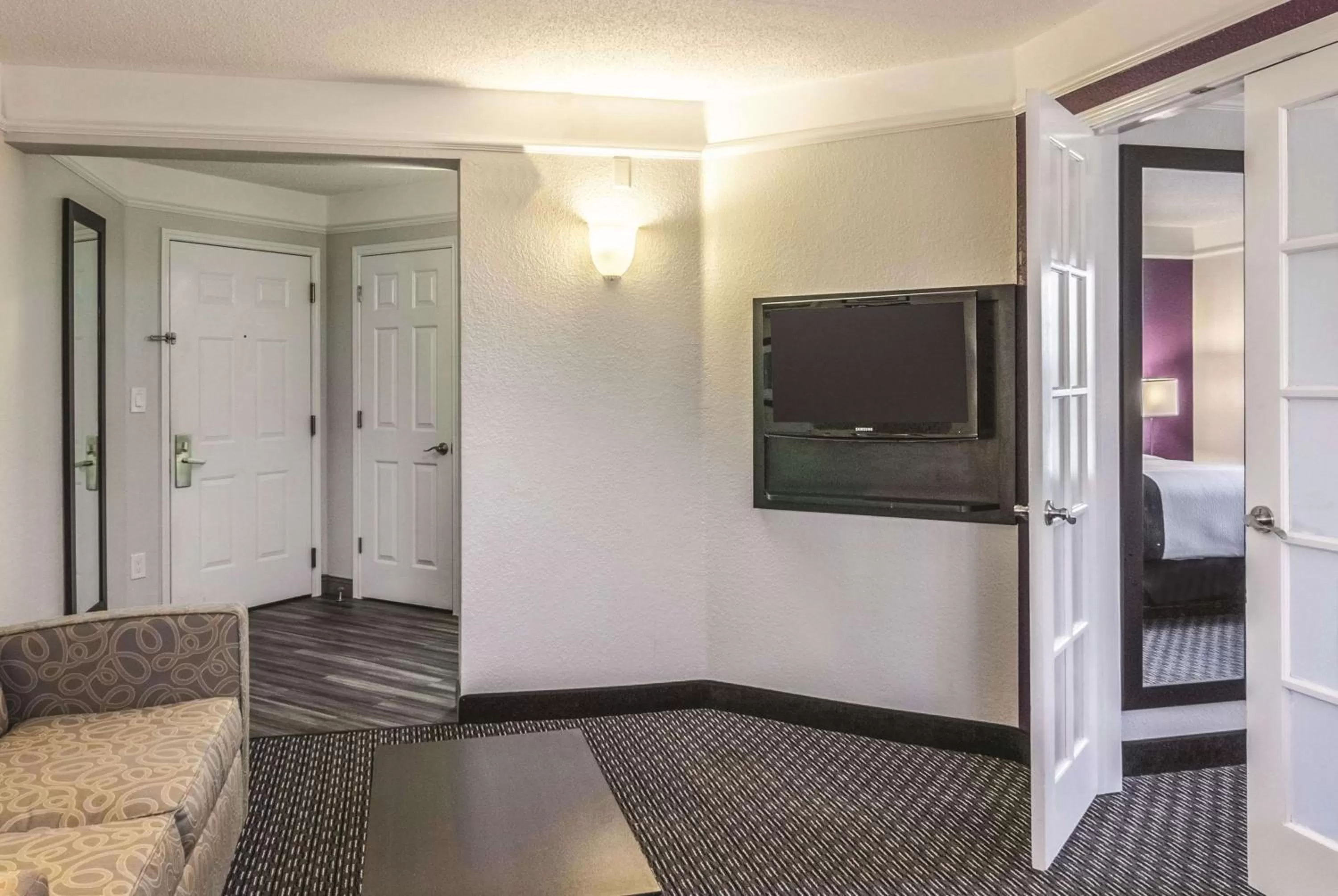 Photo of the whole room in La Quinta by Wyndham Orlando Airport North - Free Airport Shuttle!