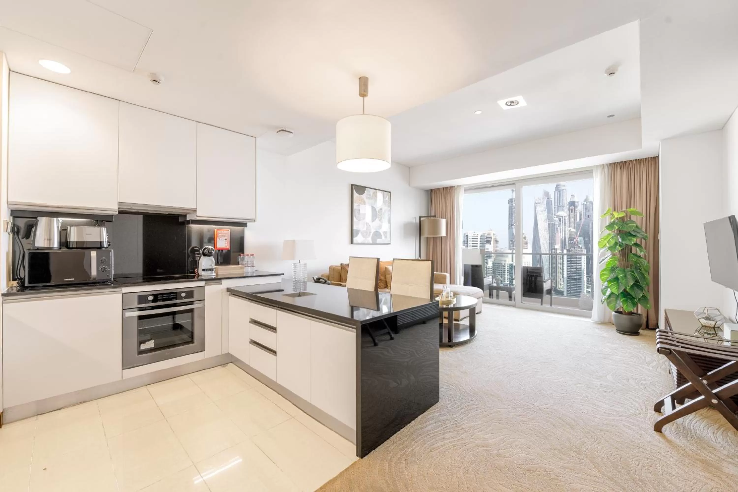Kitchen or kitchenette in Emaar Residences Dubai Marina by Qstay - formerly Address Dubai Marina