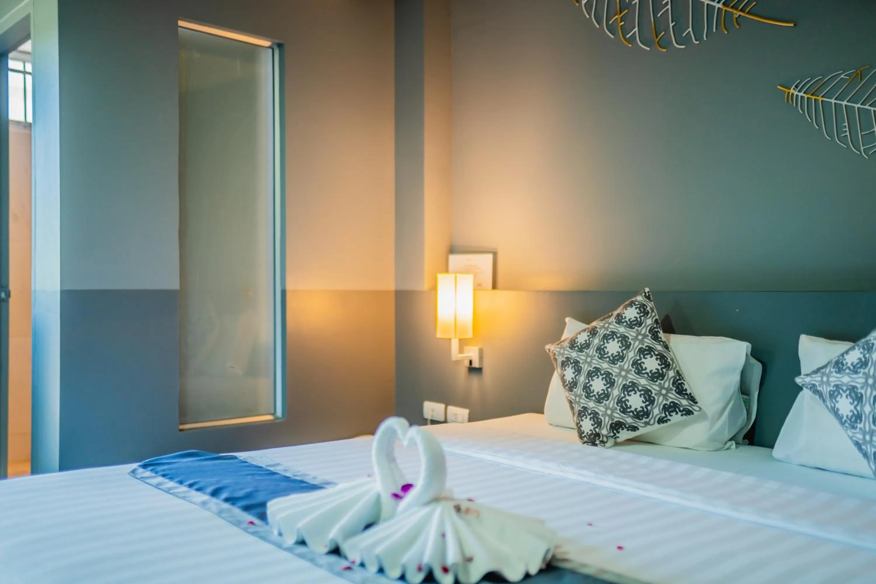 Bed in The Rubber Hotel Phuket