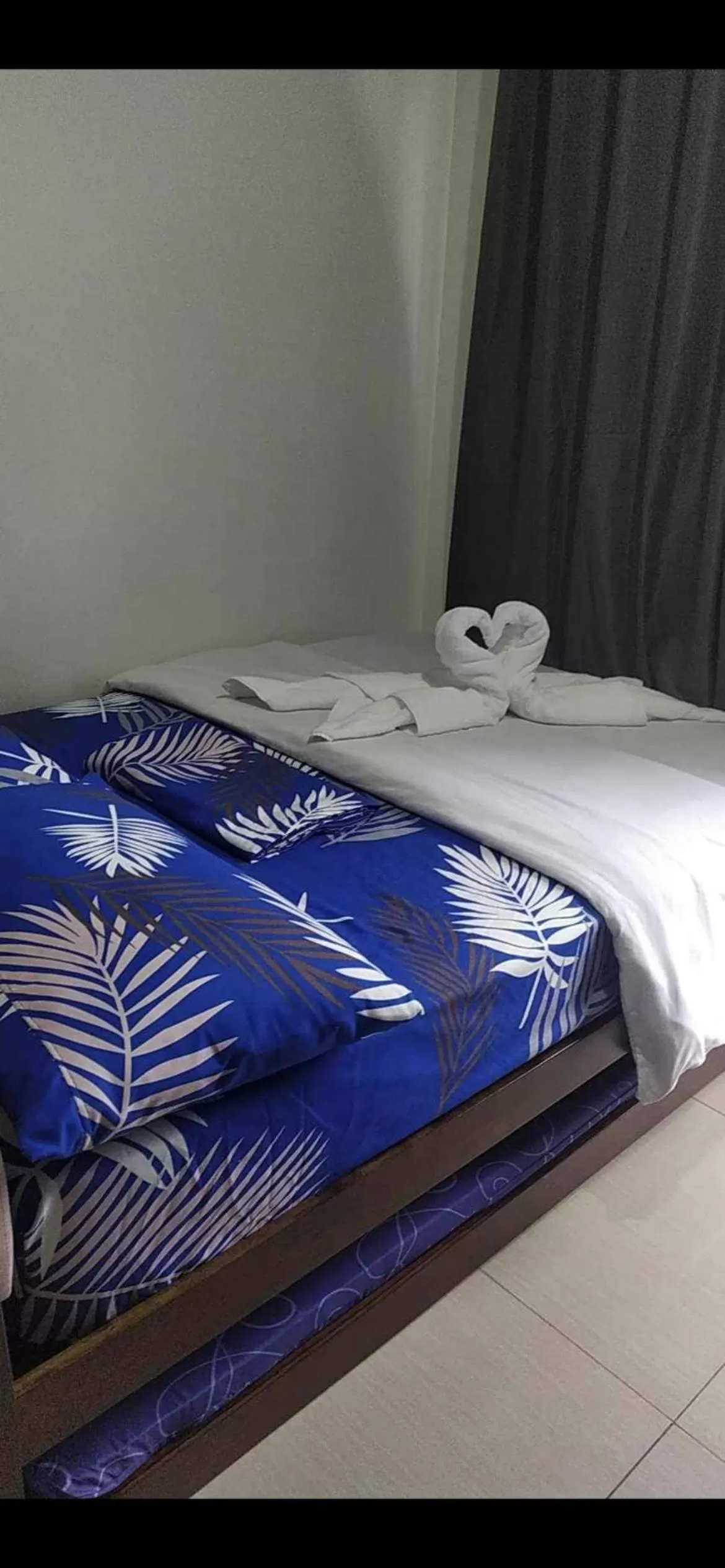 Bedroom in NorChel's Staycation near Mall of Asia