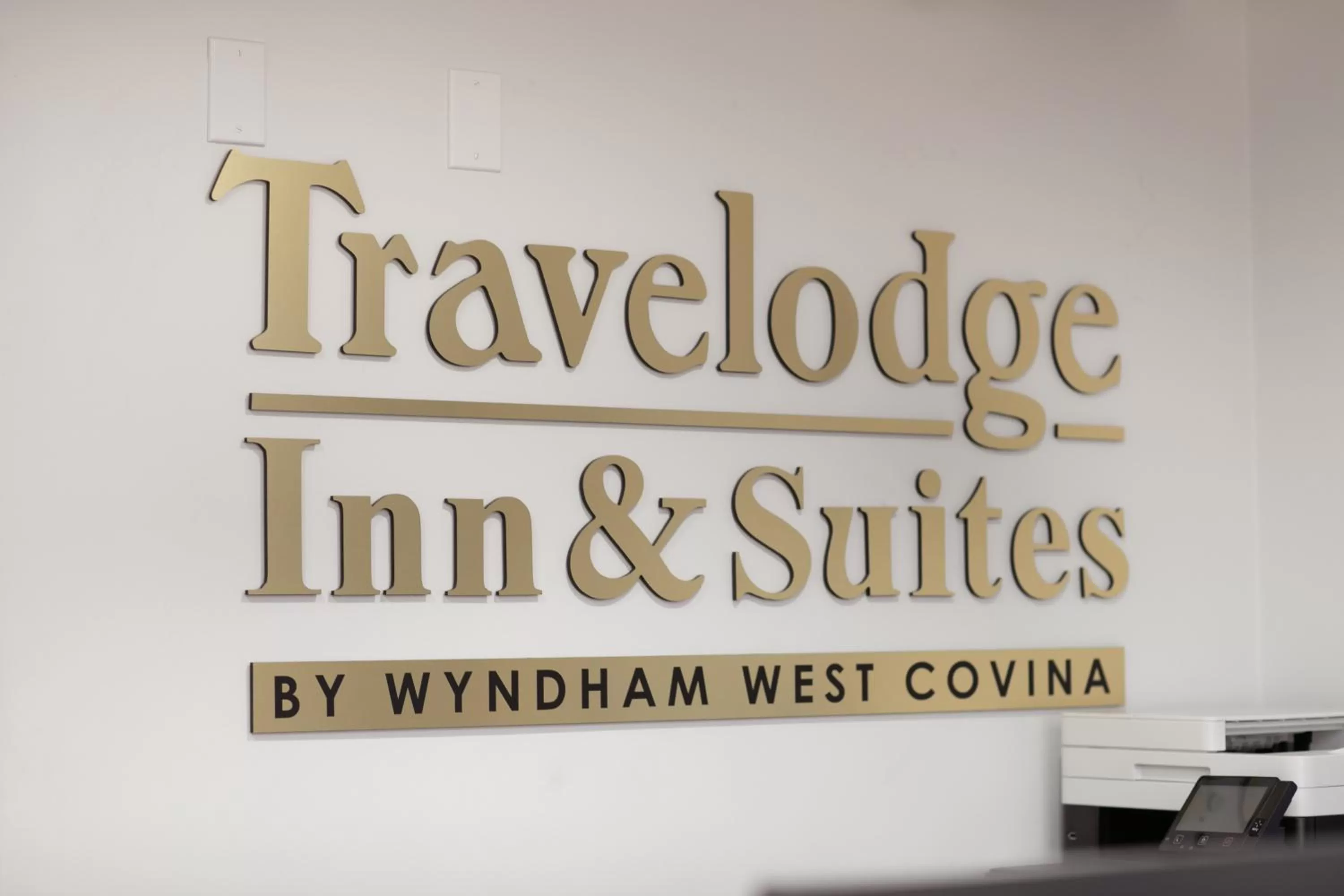 Property logo or sign in Travelodge Inn & Suites by Wyndham West Covina