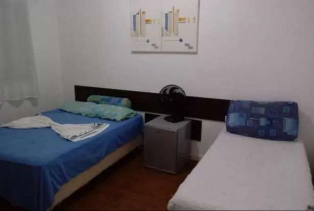 Bed in Pousada Villas