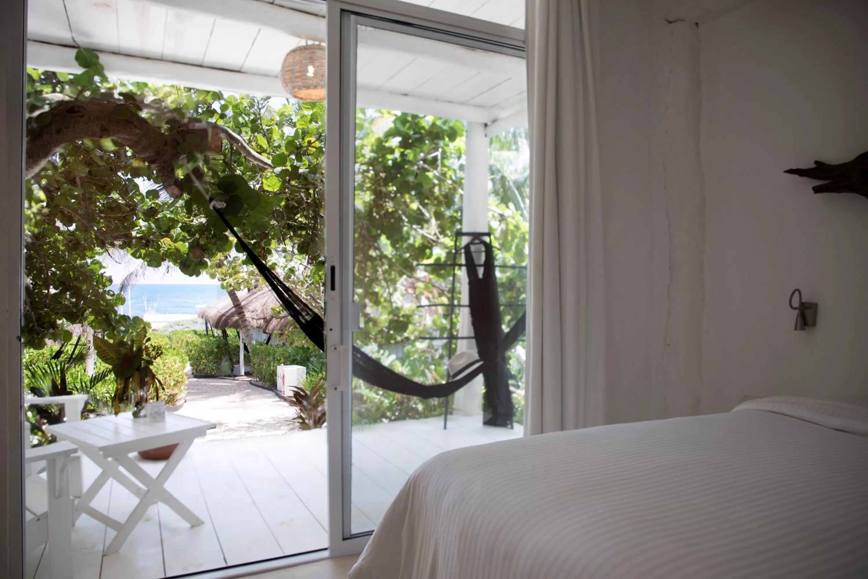 Bed in Coco Tulum Beach Club Hotel