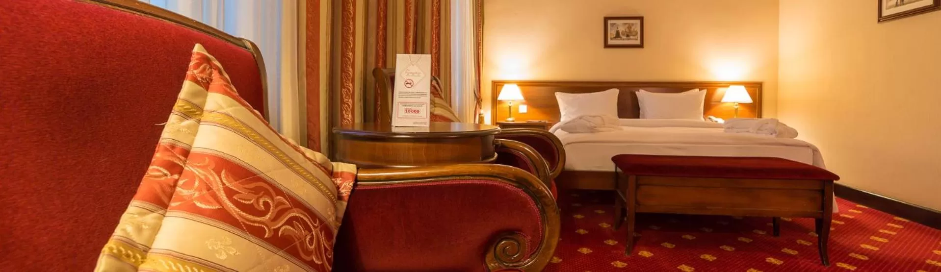 Bed in Grand Tien Shan Hotel