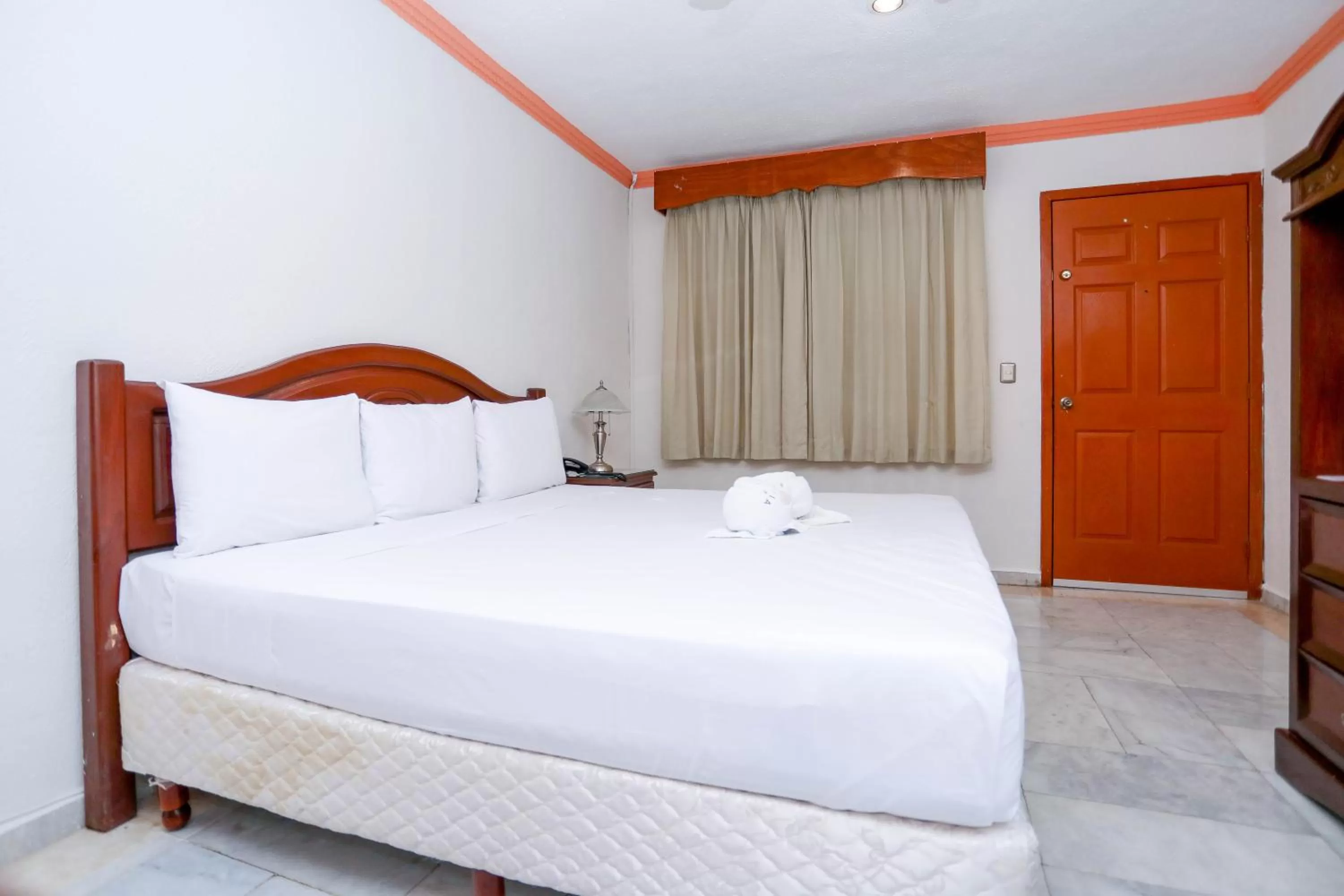 Bed in Hotel Avenida Cancun