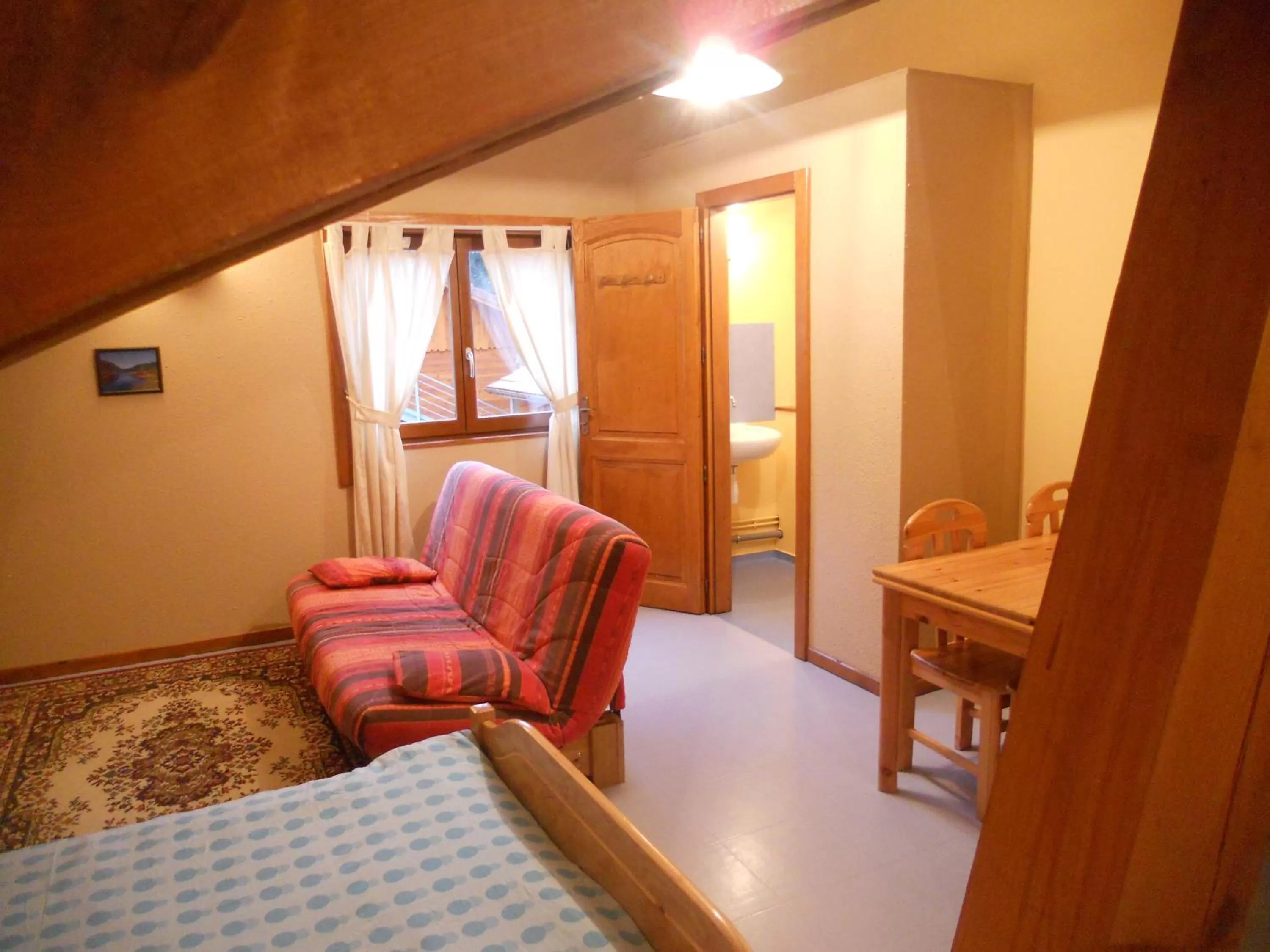 Decorative detail, Bed in Auberge du Saut des Cuves