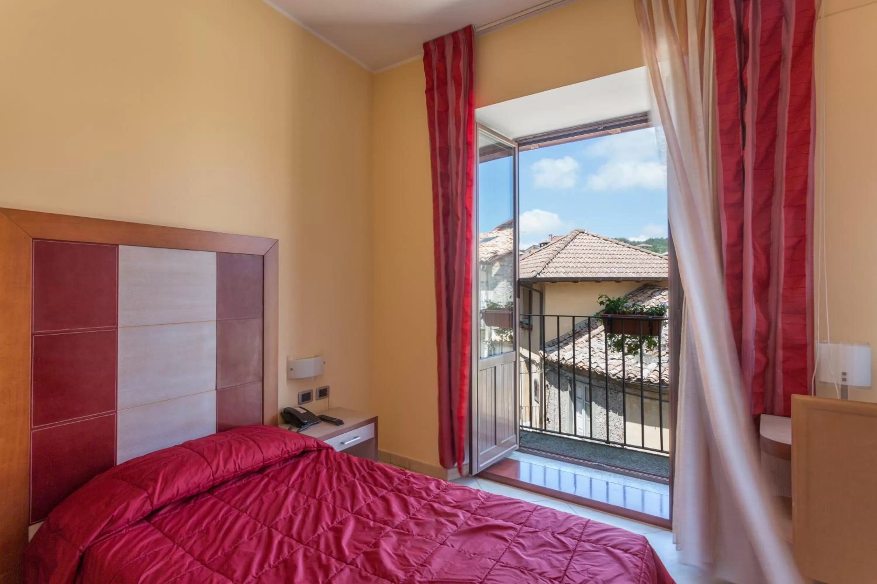 Bed in Hotel Conte Ruggero